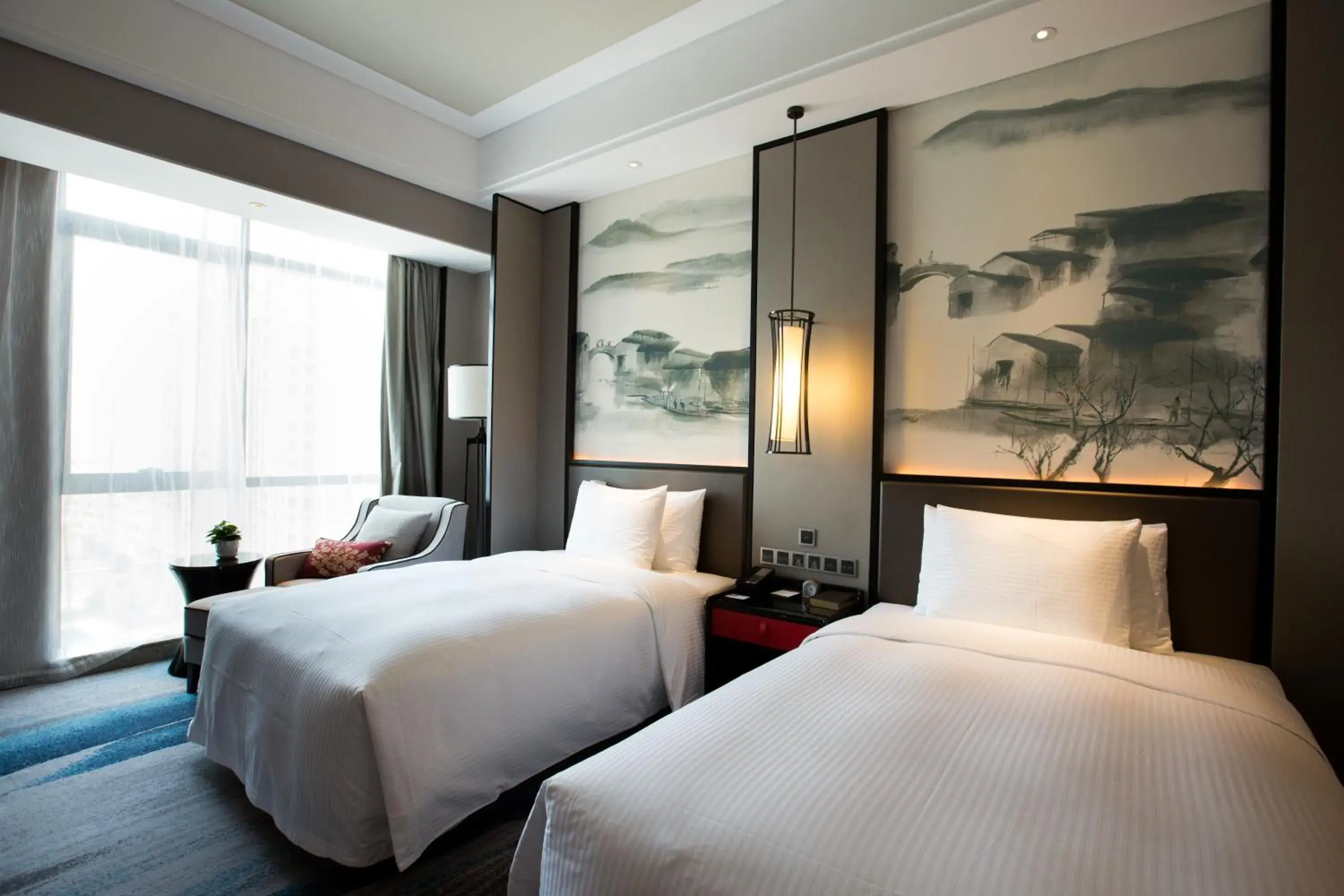 Deluxe Twin Room in Wanda Realm Yiwu Deluxe Twin Room in Wanda Realm Yiwu