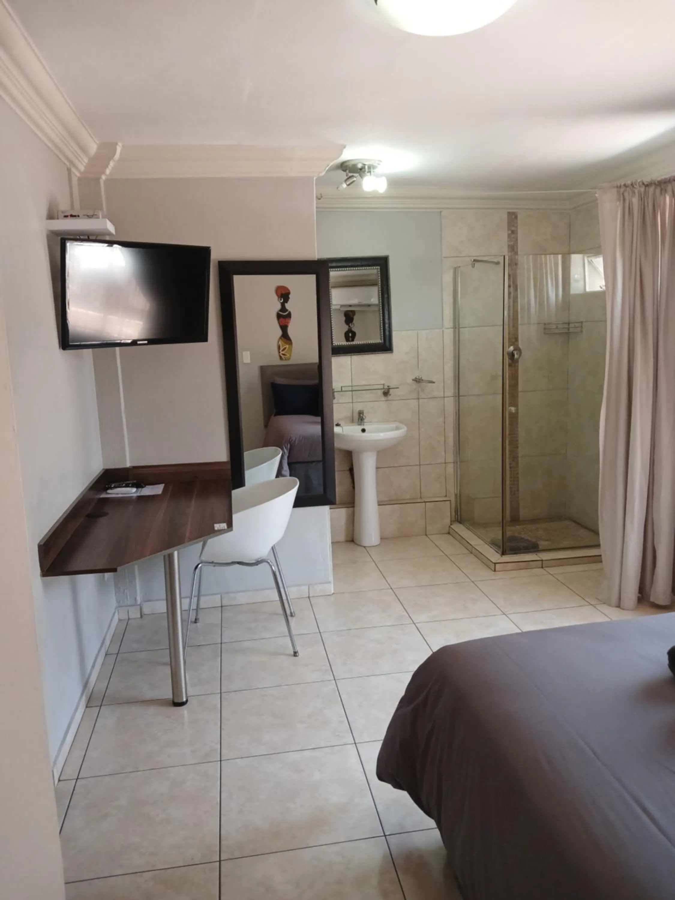 Bed in Blue Sparrow Guest House