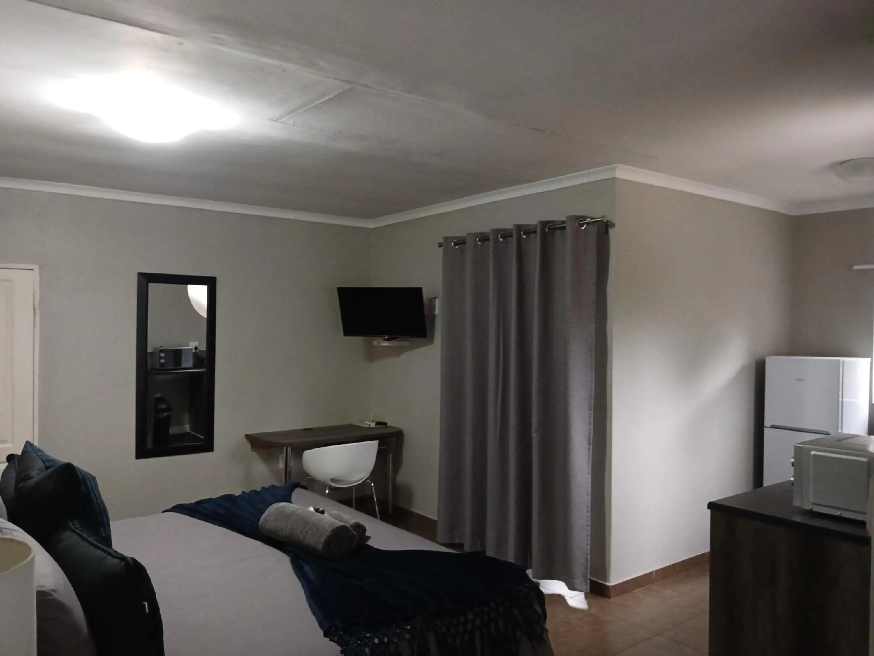 Bed in Blue Sparrow Guest House