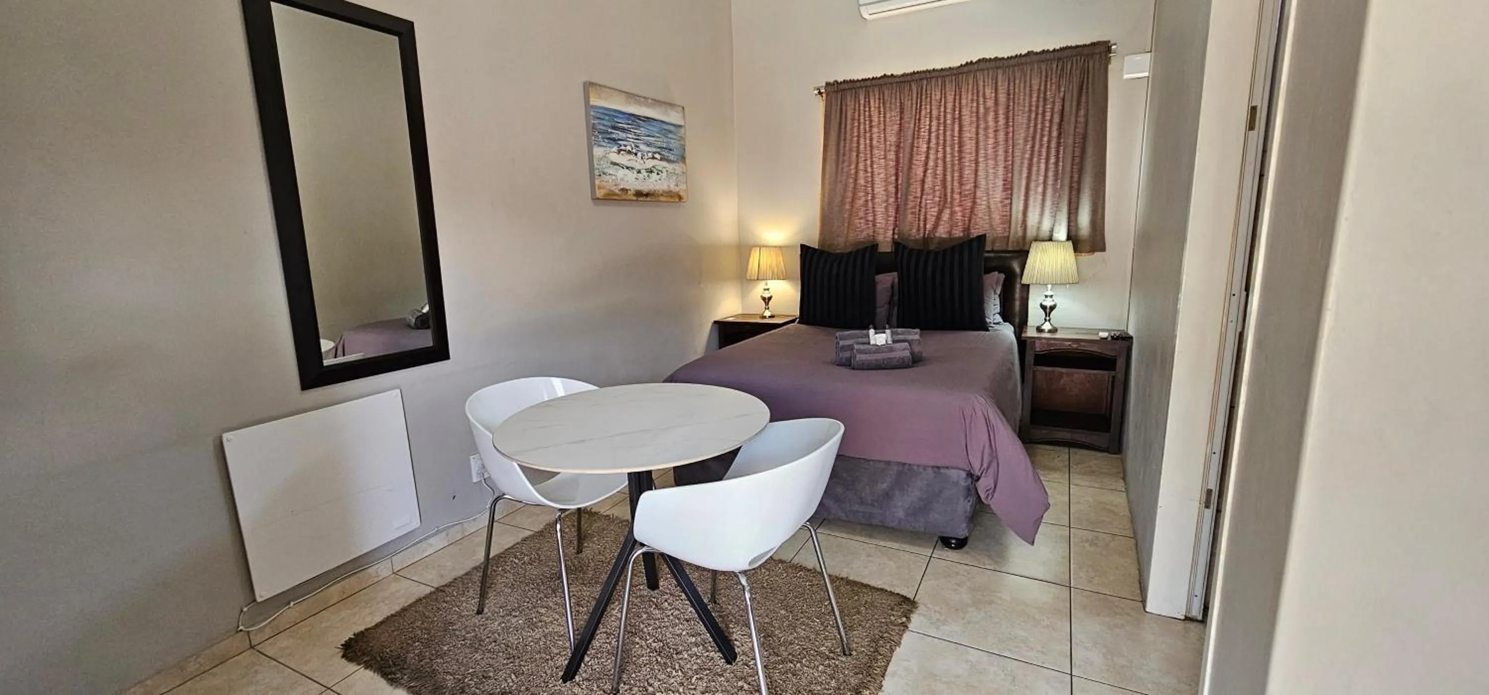 Bed in Blue Sparrow Guest House