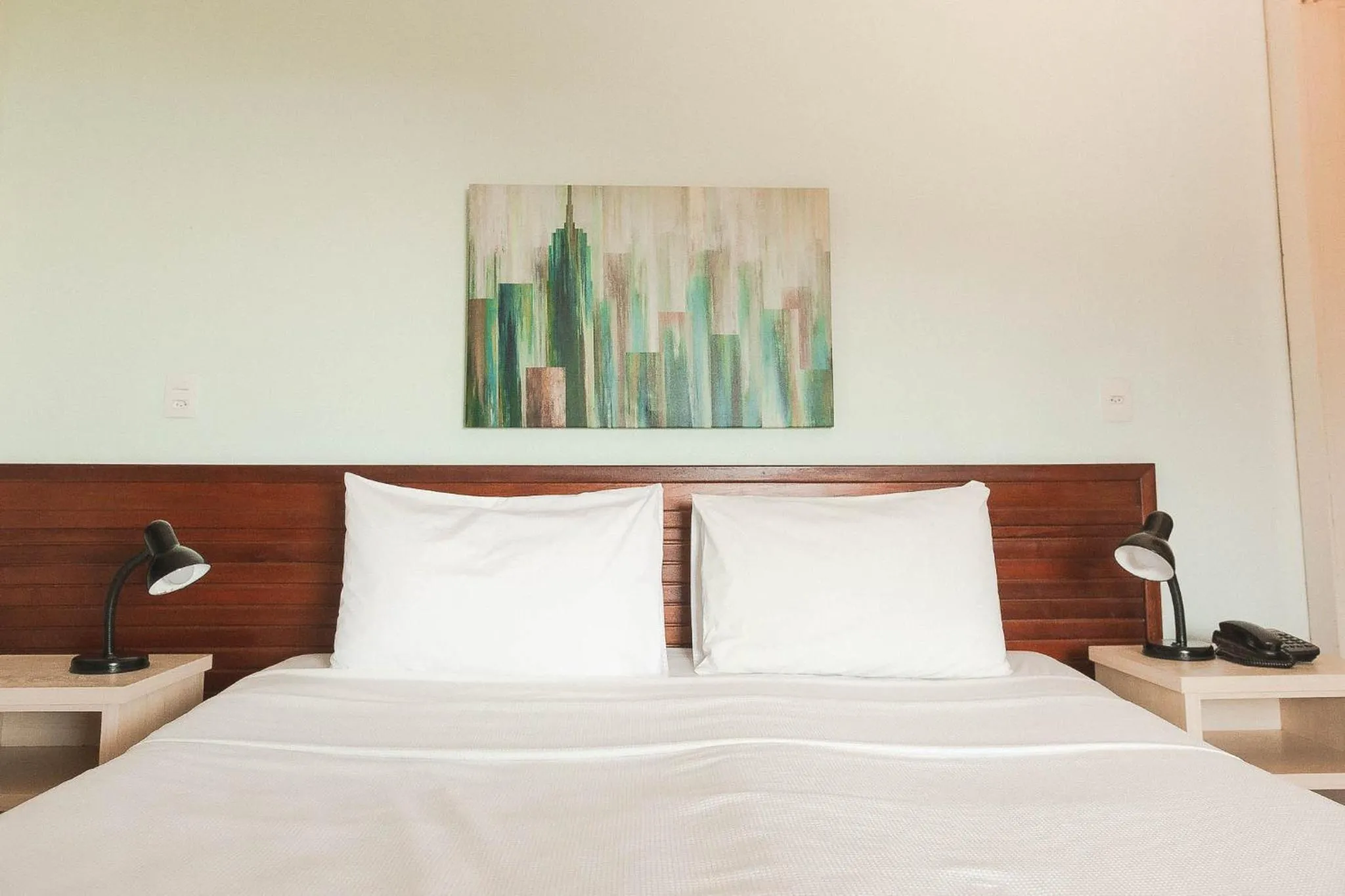 Bed in Colonna Galapagos Garden Hotel