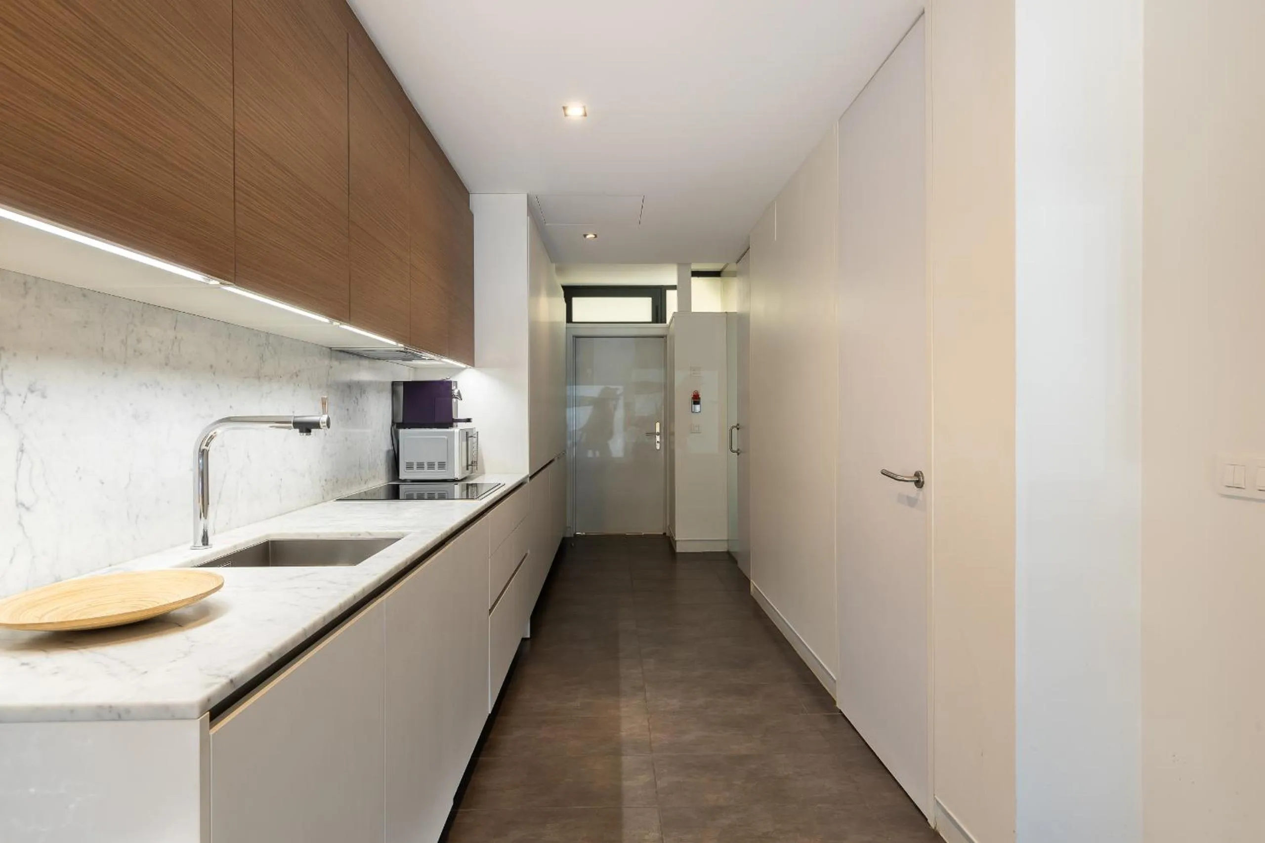 Kitchen or kitchenette in Cosmo Apartments Sants