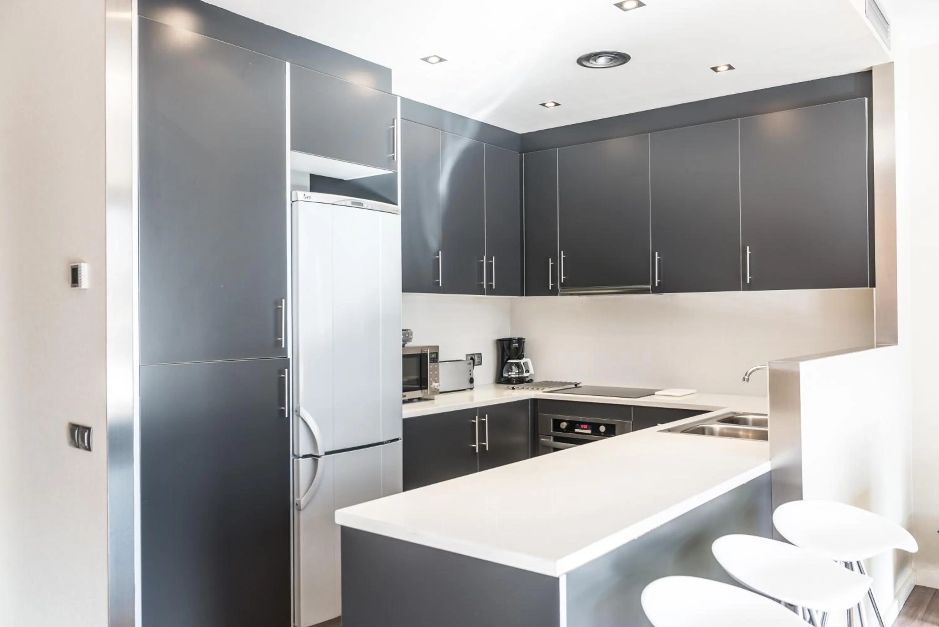 Kitchen or kitchenette in Casp 74 Apartments