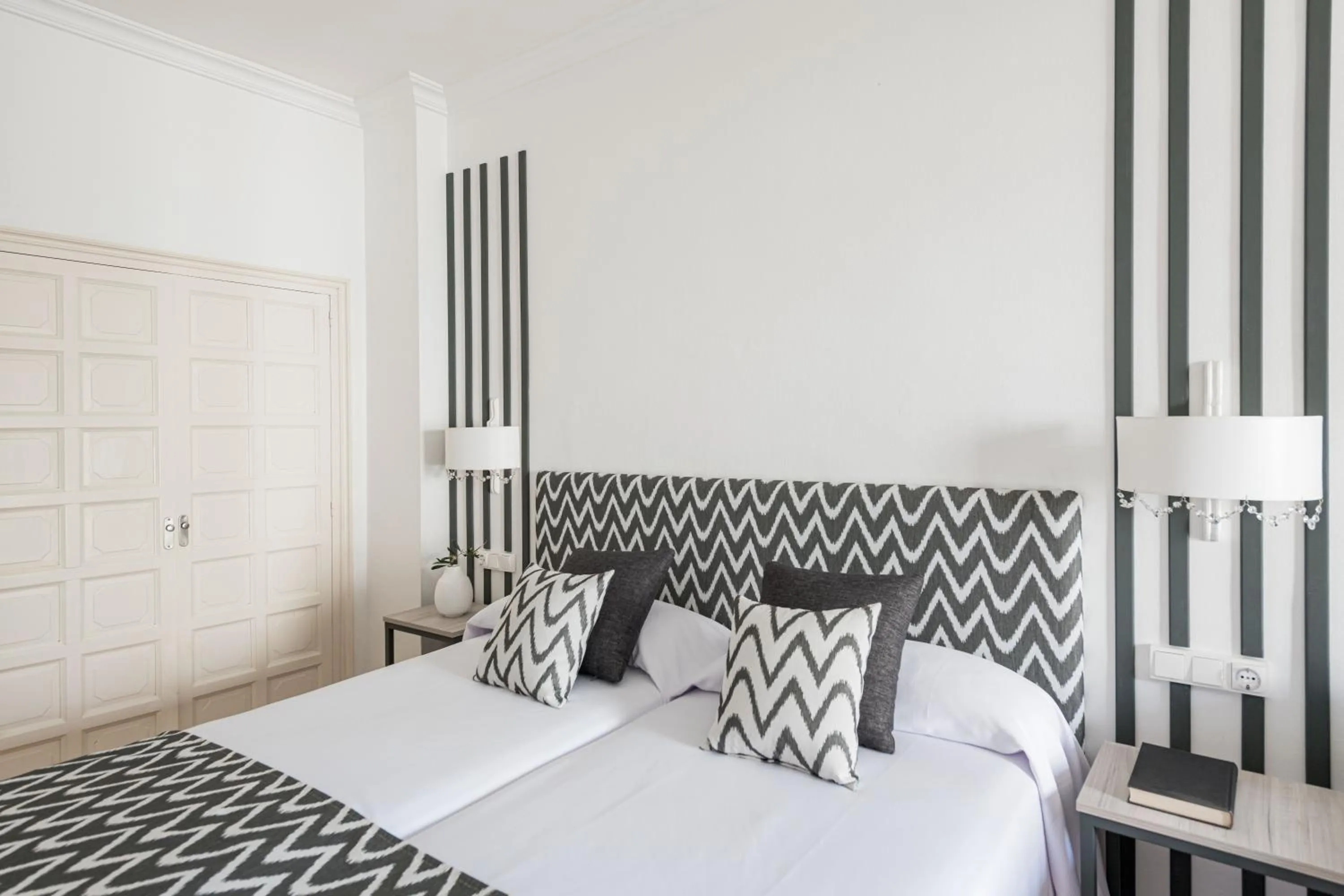 Bed in Hotel Rosamar