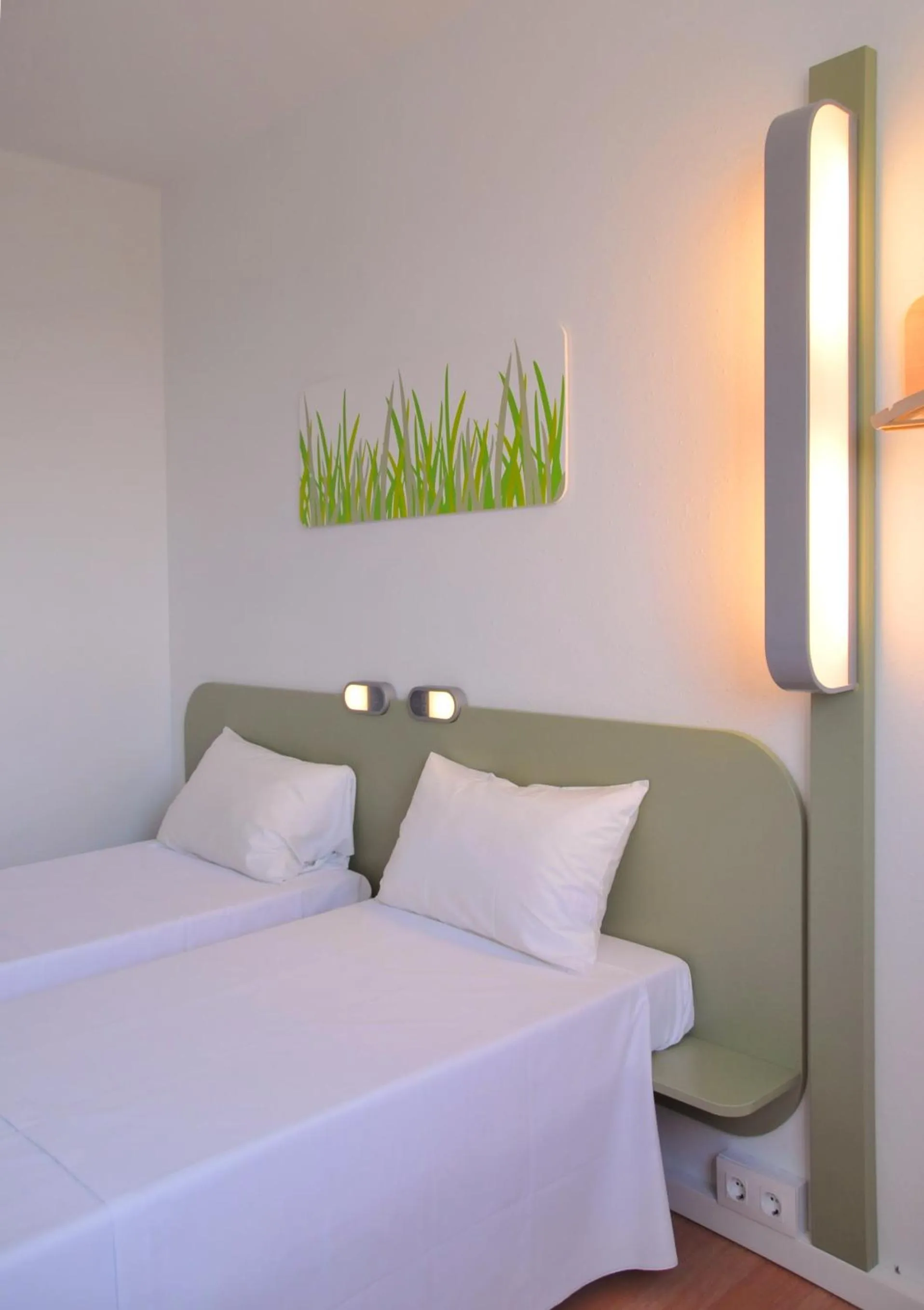 Bed in Ibis Budget Girona Costa Brava