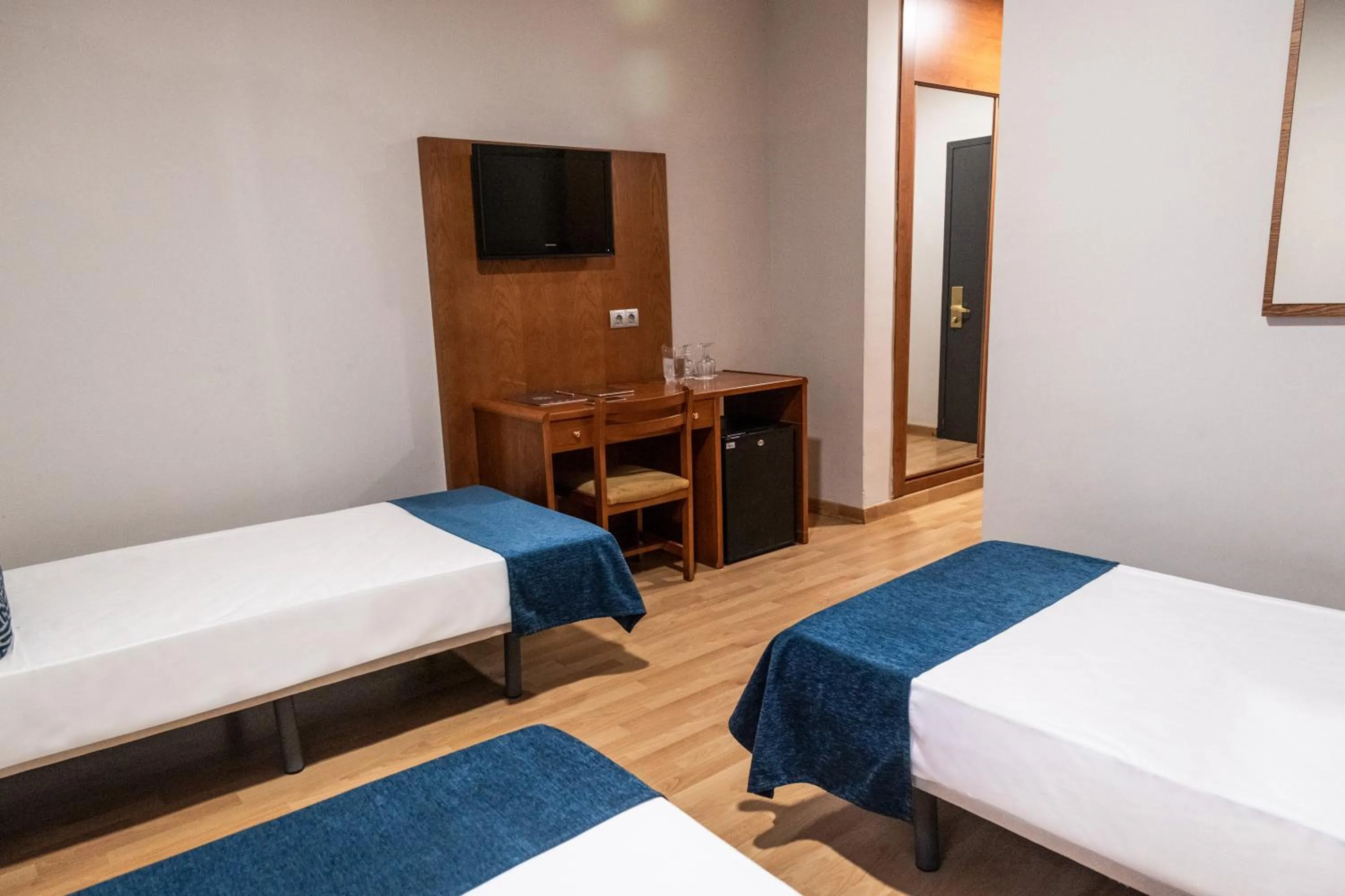 Bed in Hotel Adonis Plaza