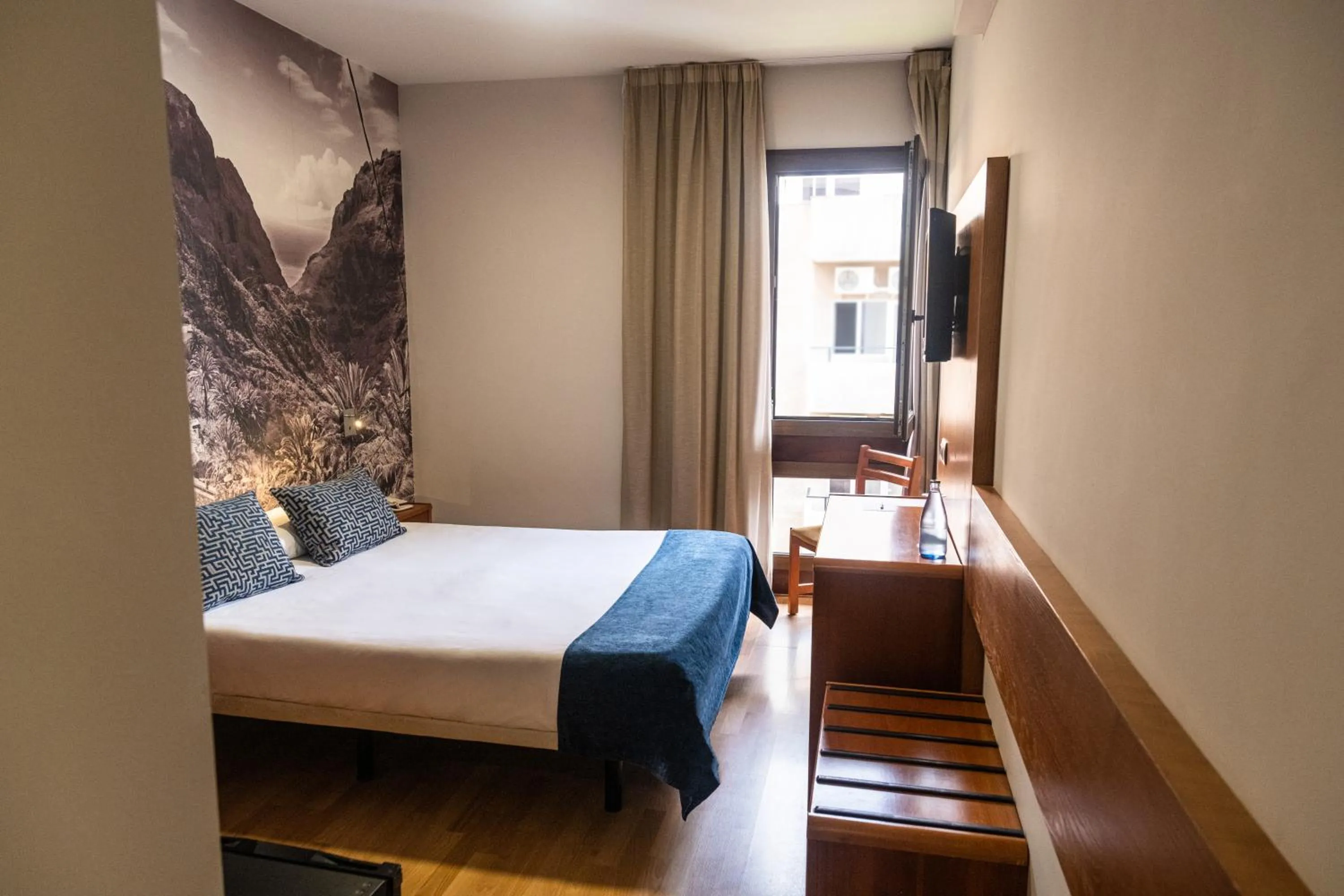 Bed in Hotel Adonis Plaza