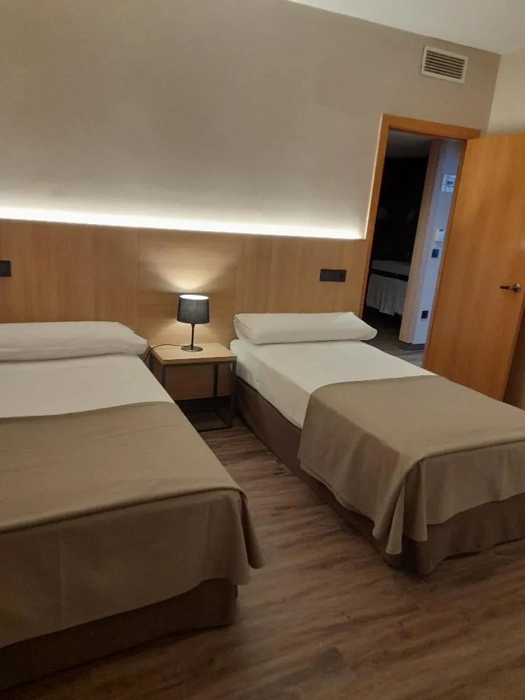 Bed in SOMMOS Hotel Benasque Spa