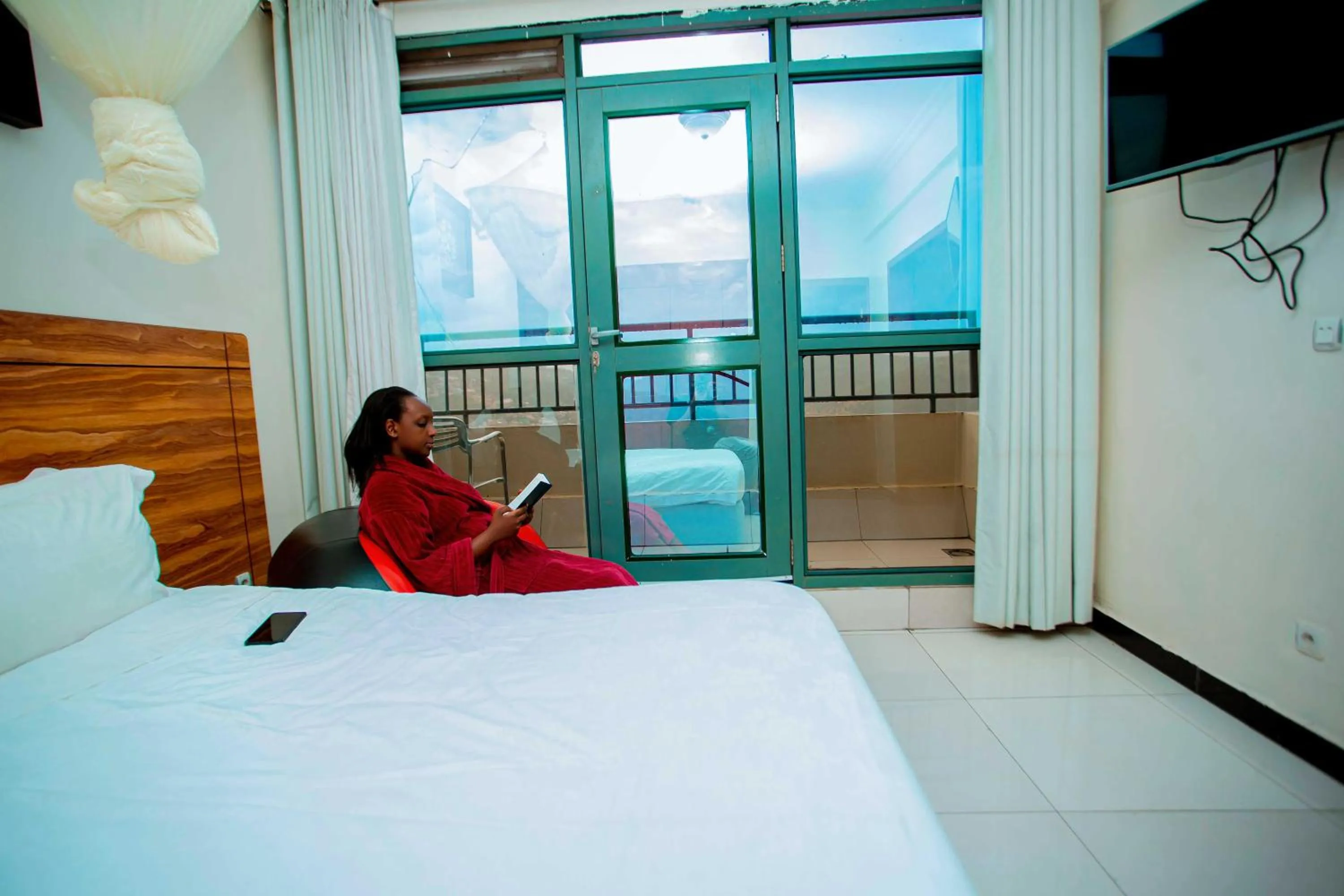 Bed in La Posh Hotel