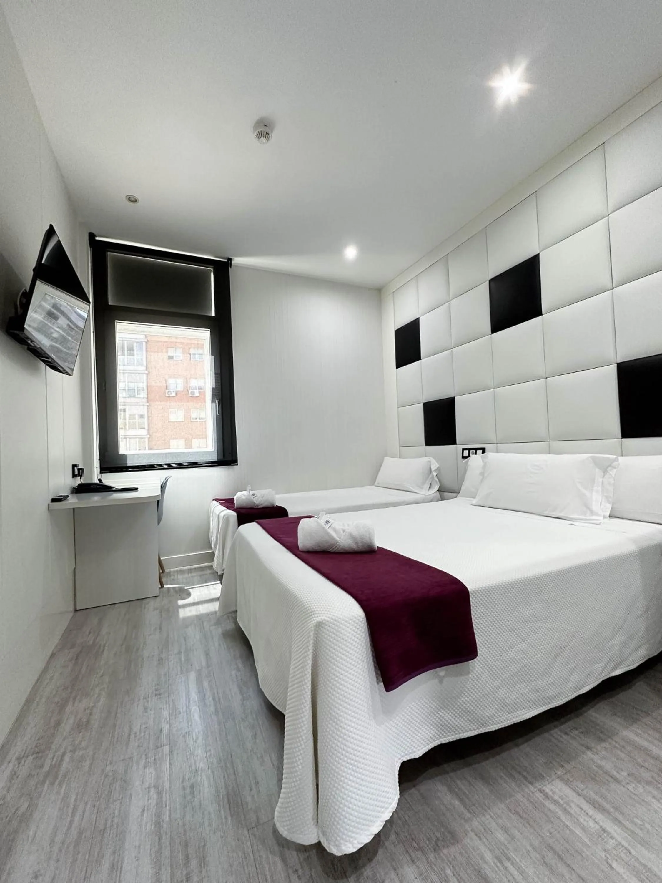 Photo of the whole room, Bed in Hoteles Urbanos N Avenida de España