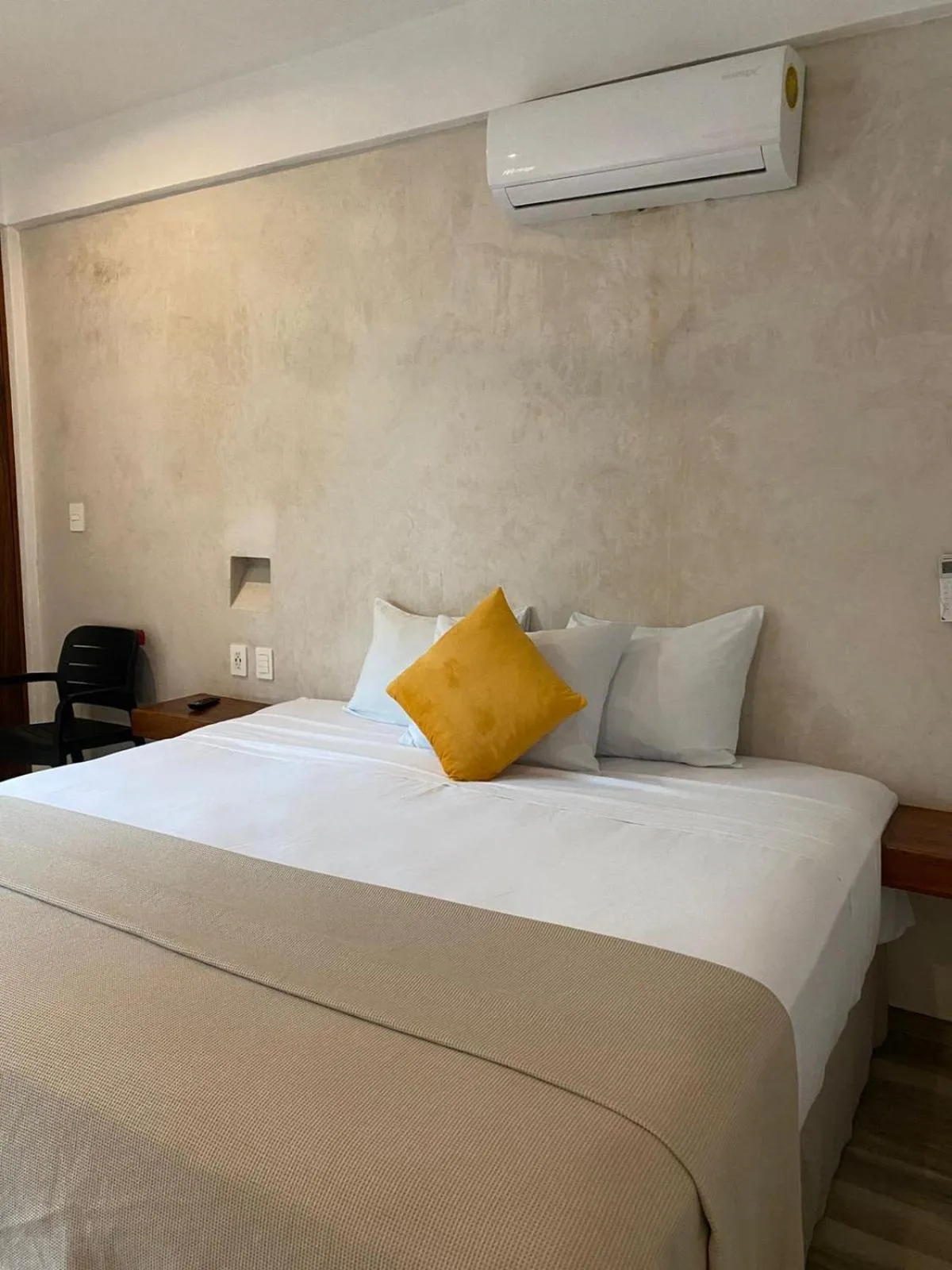Bed in Hotel Pelecanus Suites Holbox