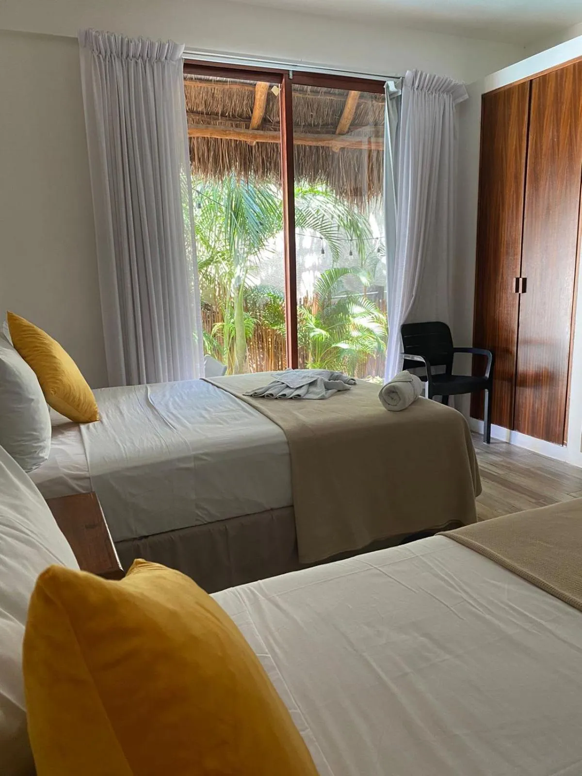 Bed in Hotel Pelecanus Suites Holbox