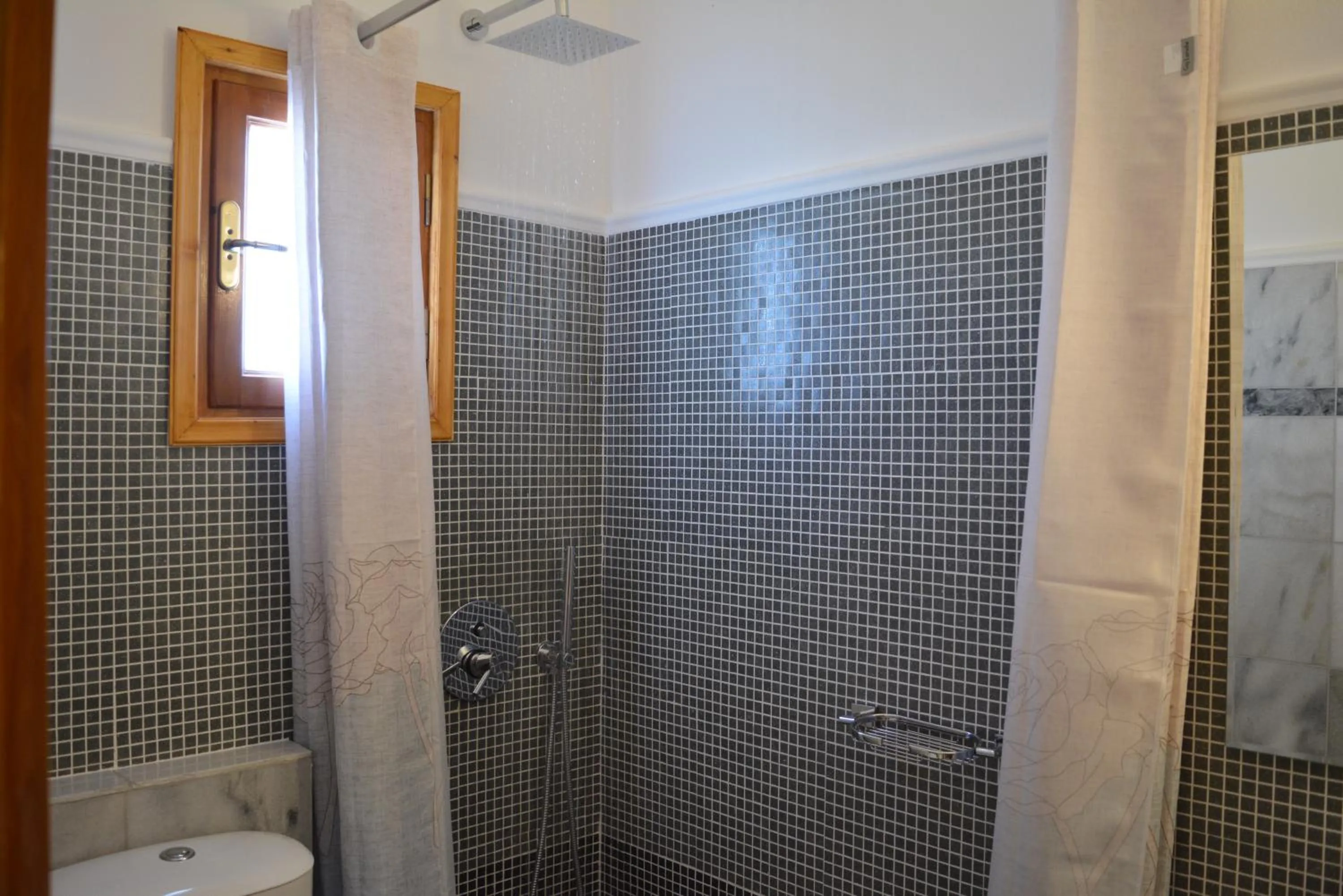 Bathroom in Anemomilos Suites