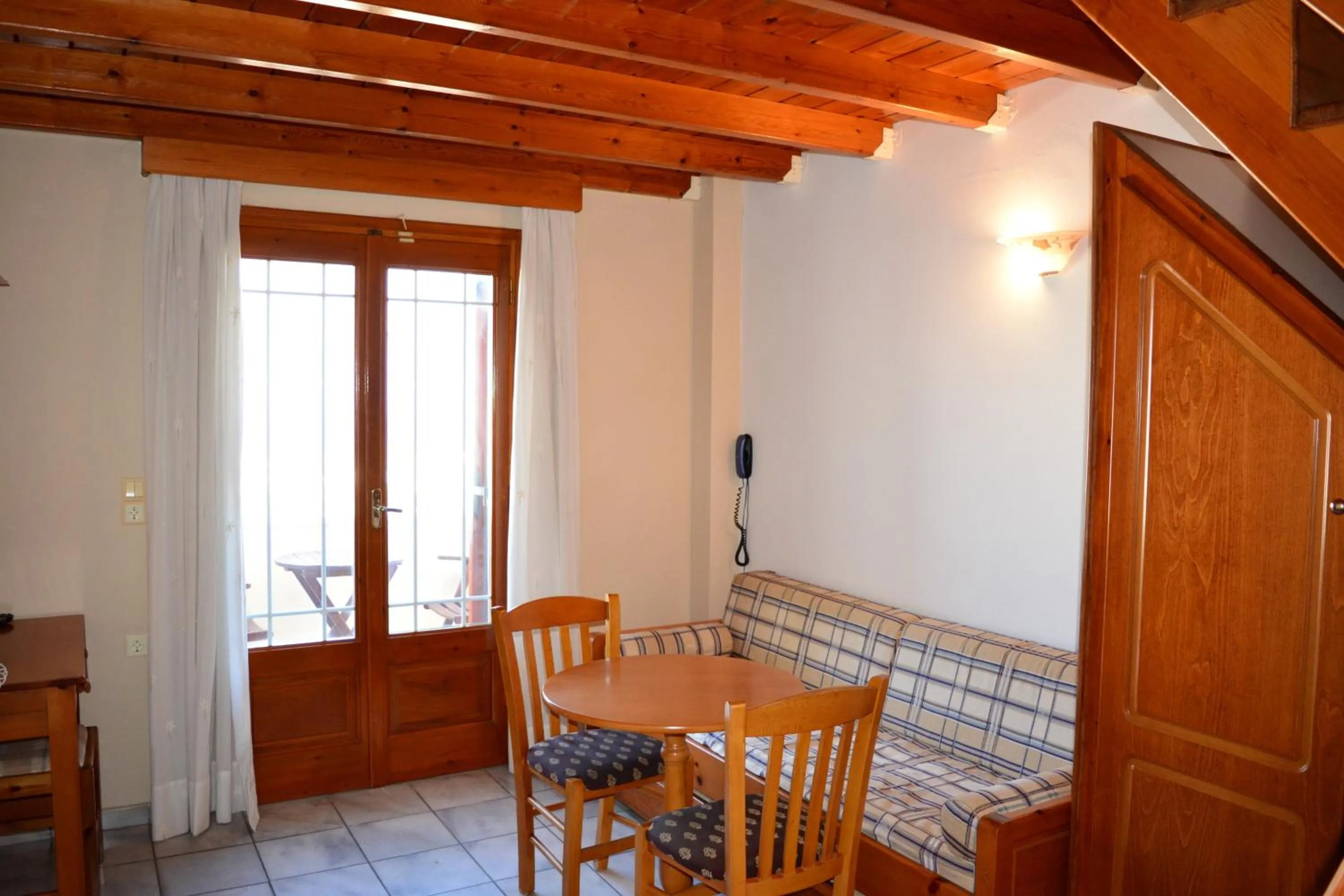 Living room in Anemomilos Suites