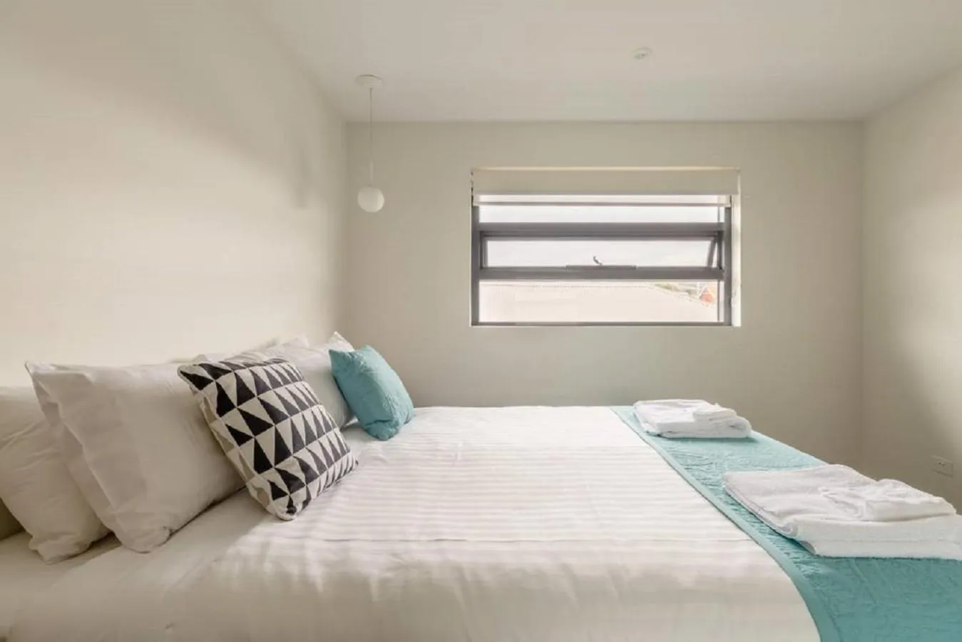 Bed in Kangaroo Bay Apartments