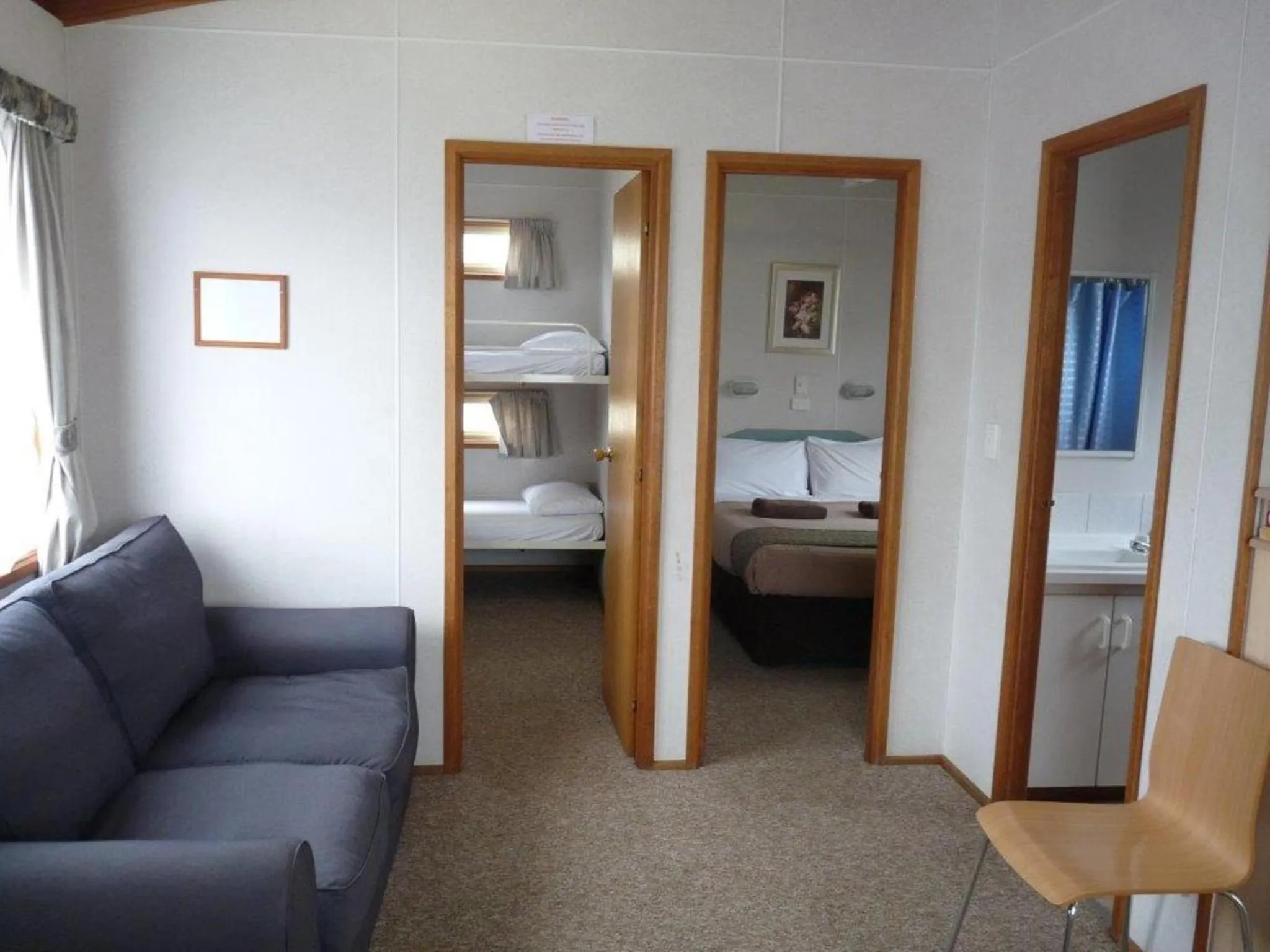 Living room, Bed in Wodonga Caravan & Cabin Park