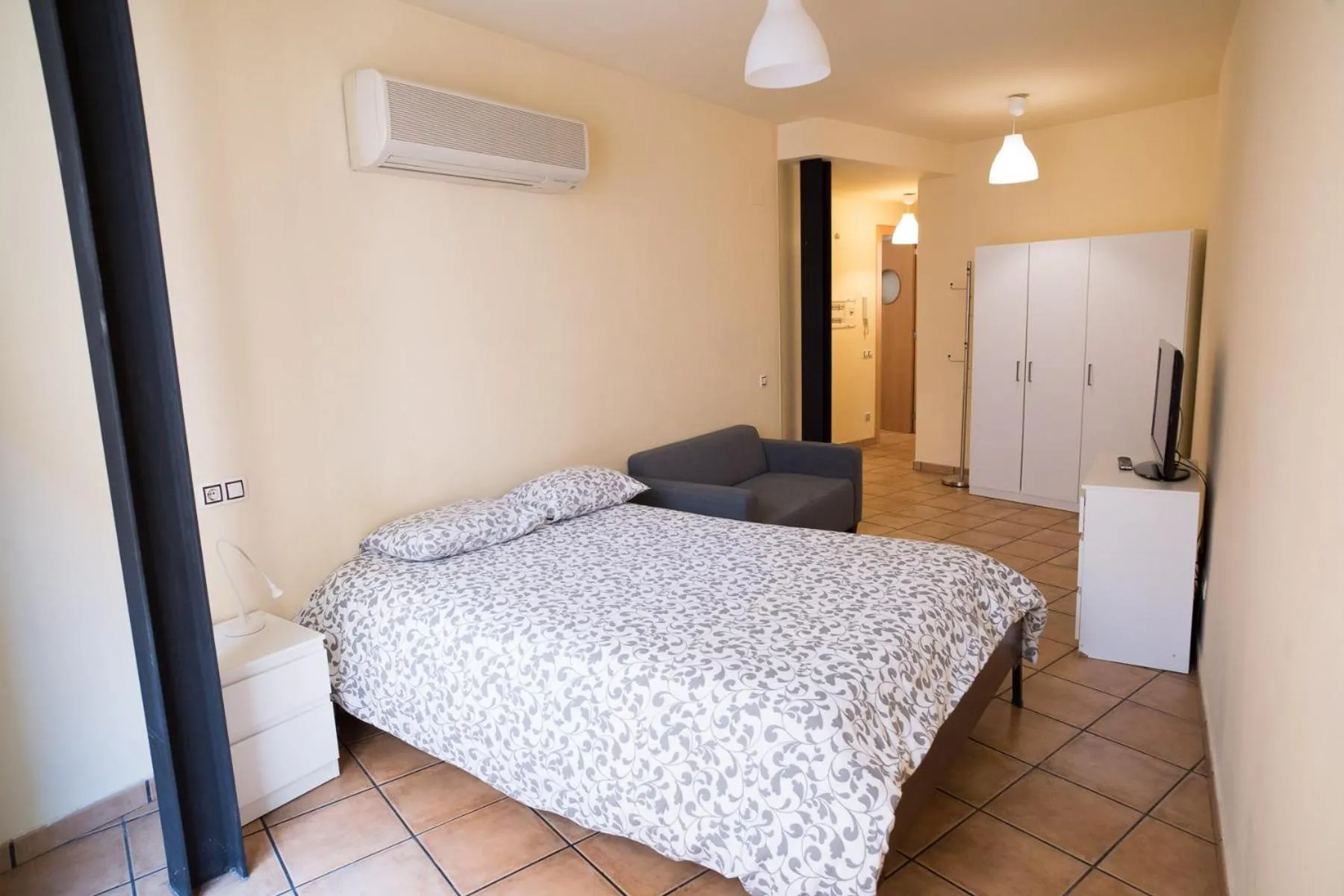 Bed in Urbi Apartments