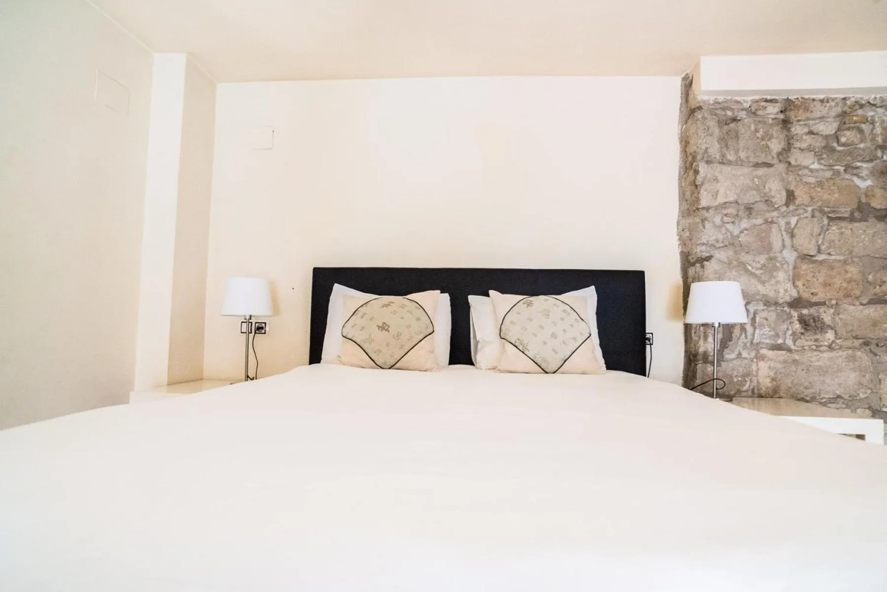 Bed in Urbi Apartments