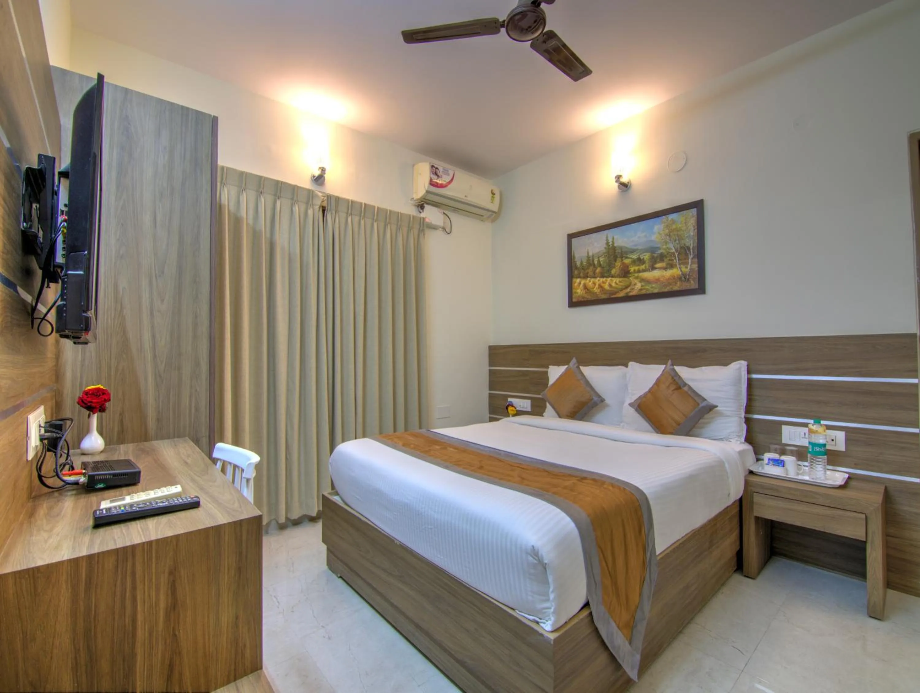 Bed in Sunshine Suites Grand Deluxe