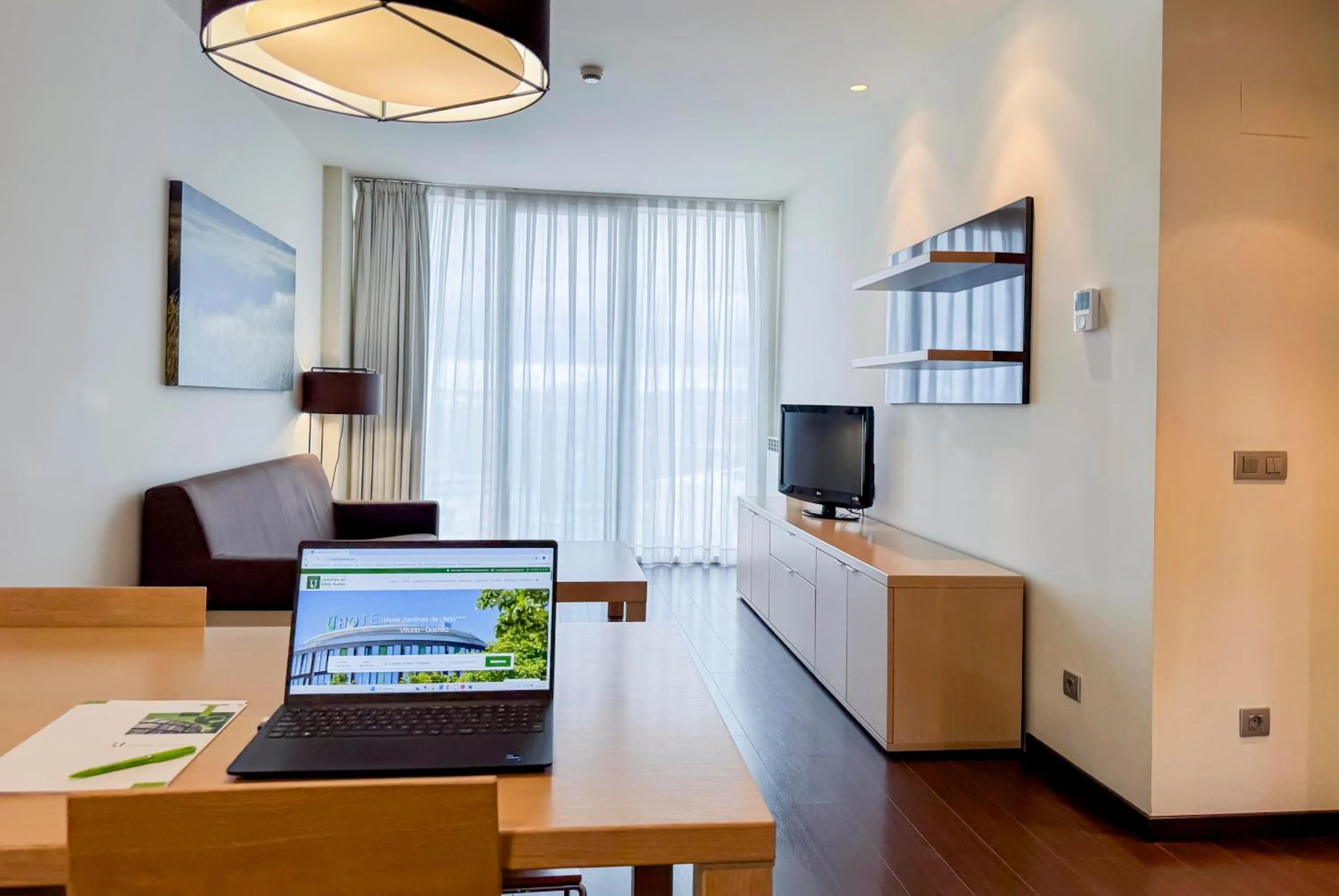 Living room in Hotel Jardines de Uleta Suites