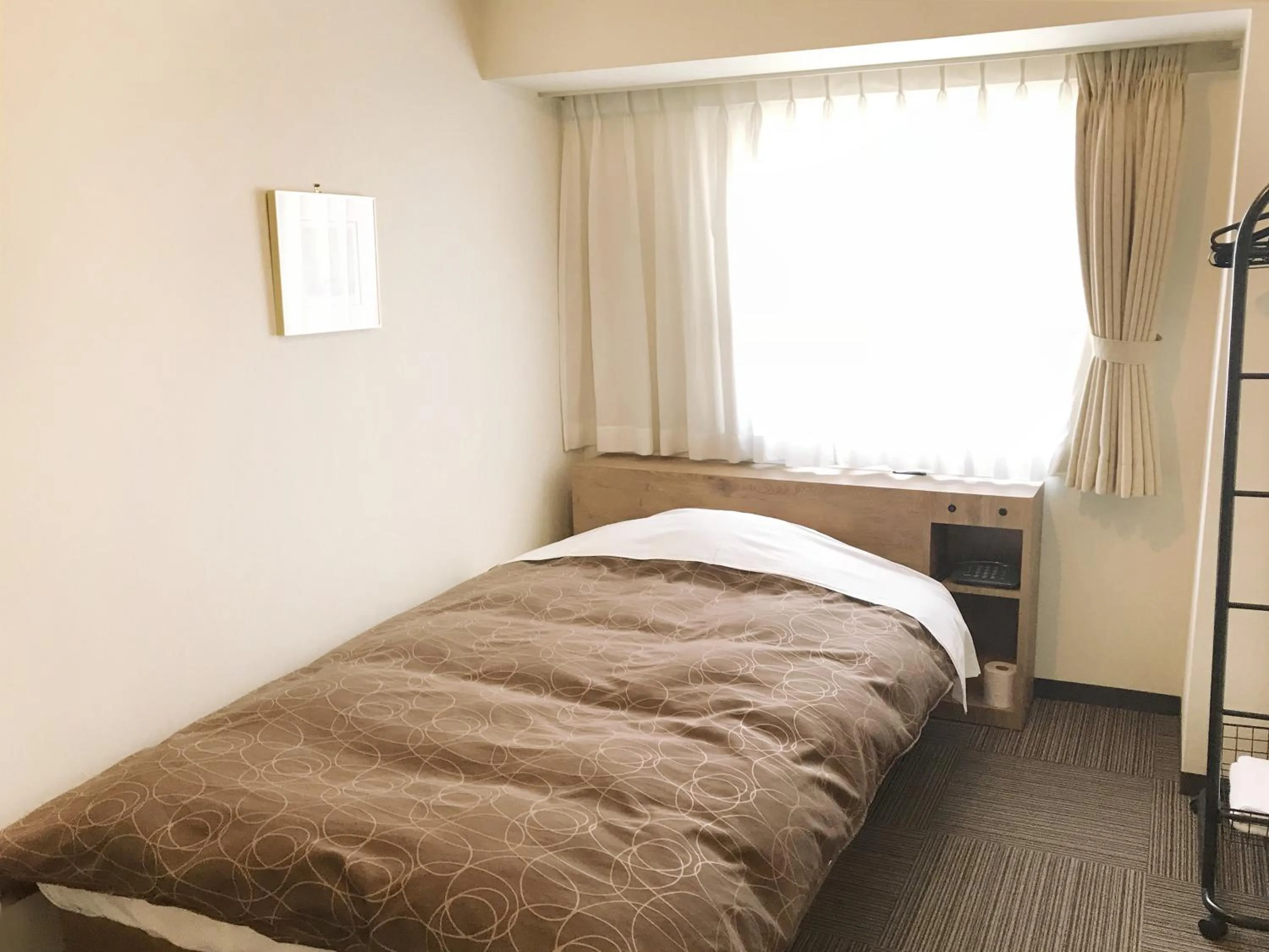 Bed in Ichinomiya Green Hotel