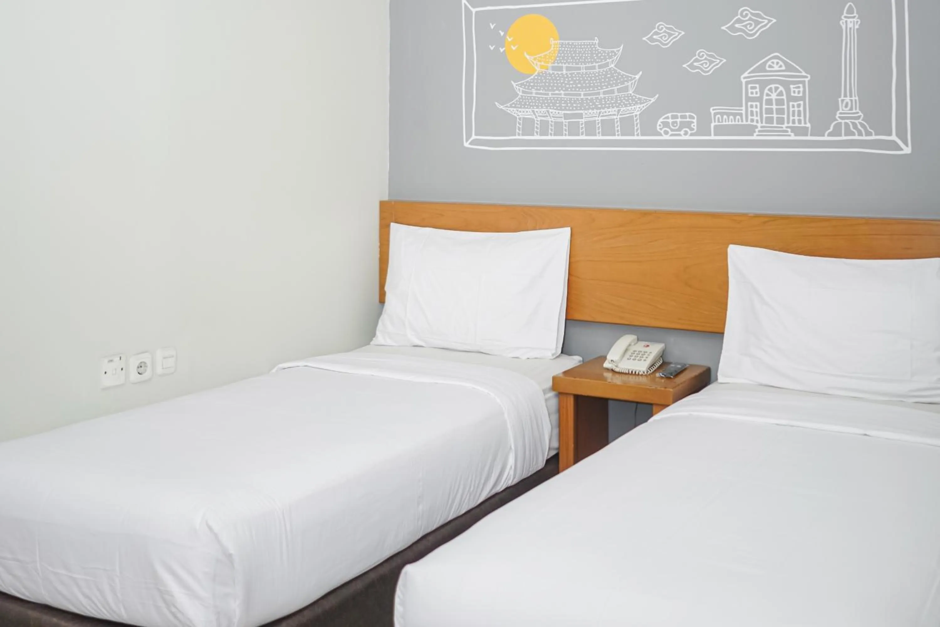 Bedroom, Bed in Sunrise Hotel Semarang