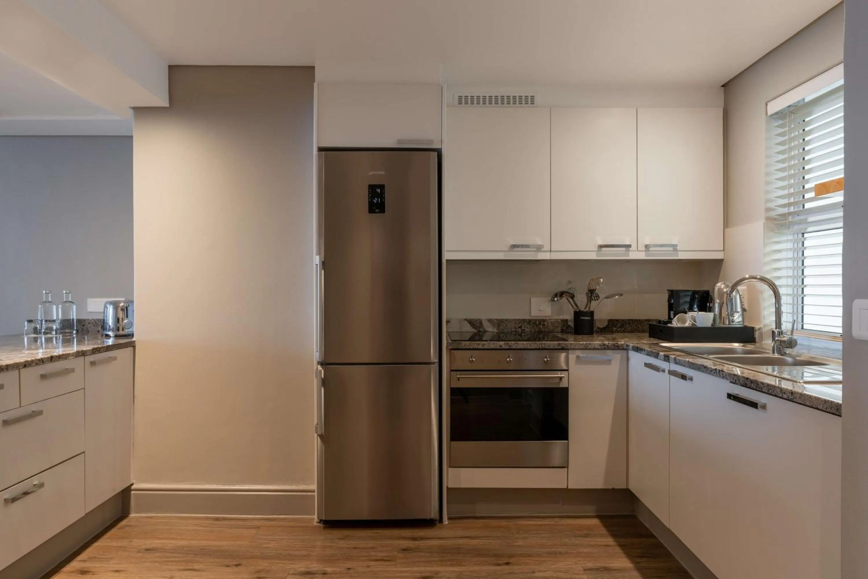 Kitchen or kitchenette in Radisson Collection Hotel, Waterfront Cape Town