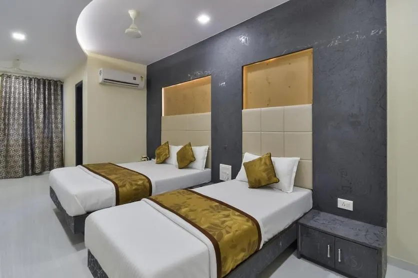 Photo of the whole room, Bed in Hotel Aroma- Dadar