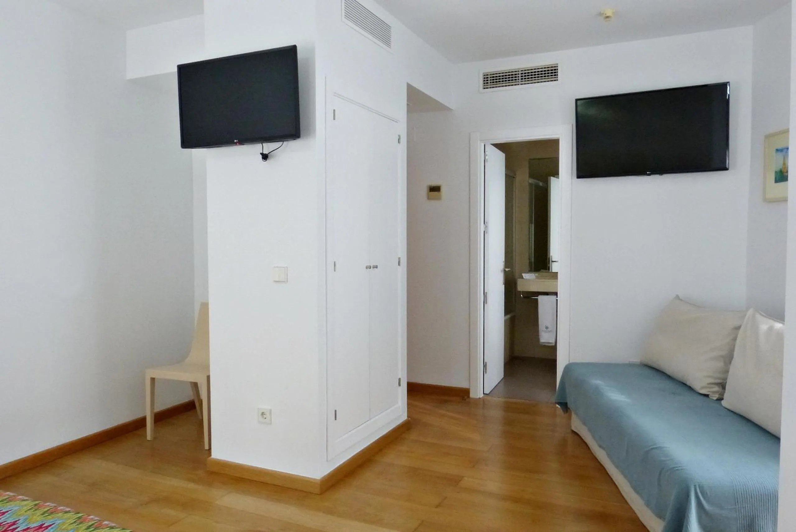 Bed in Hotel Apartamentos Patagonia Sur