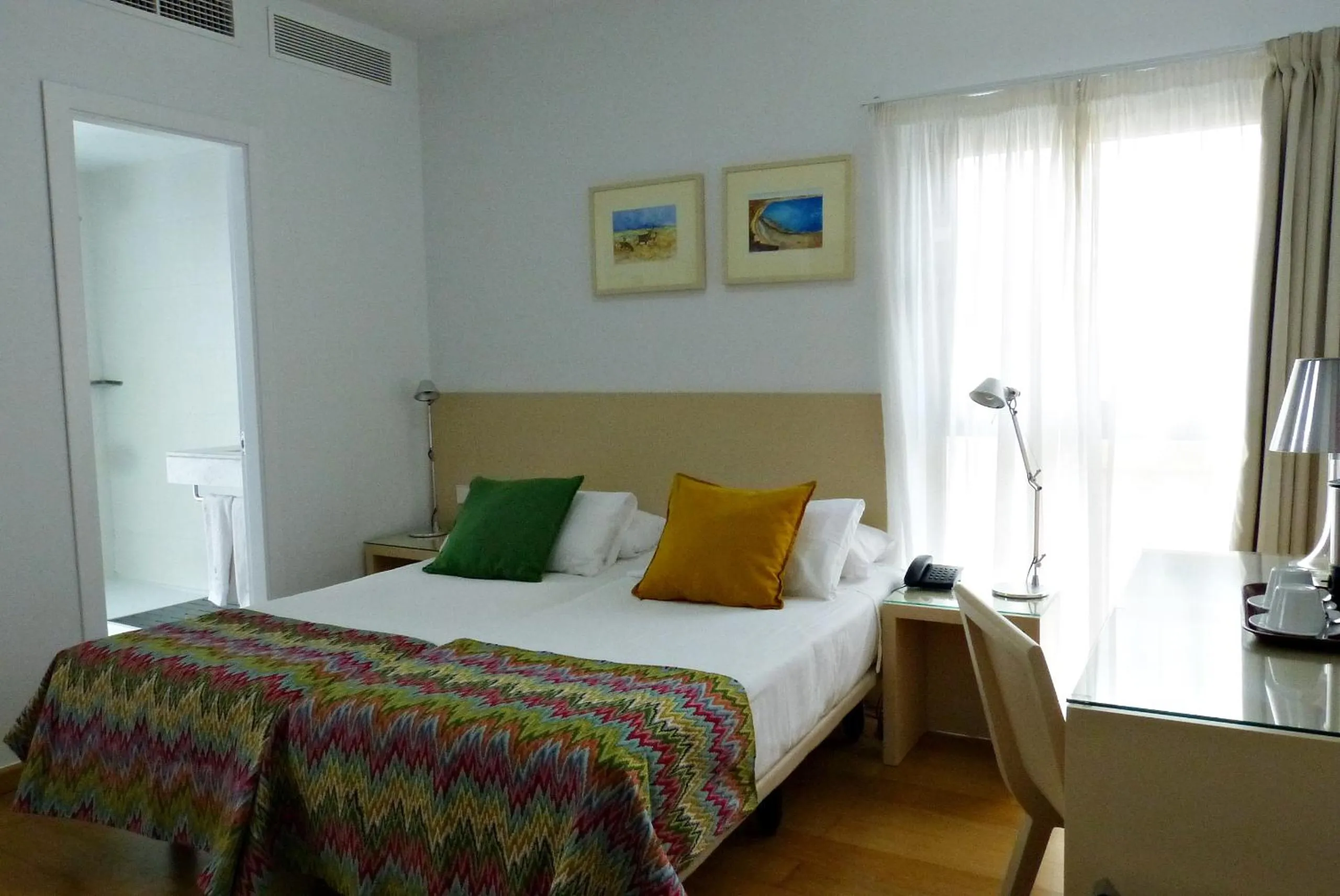 Bed in Hotel Apartamentos Patagonia Sur