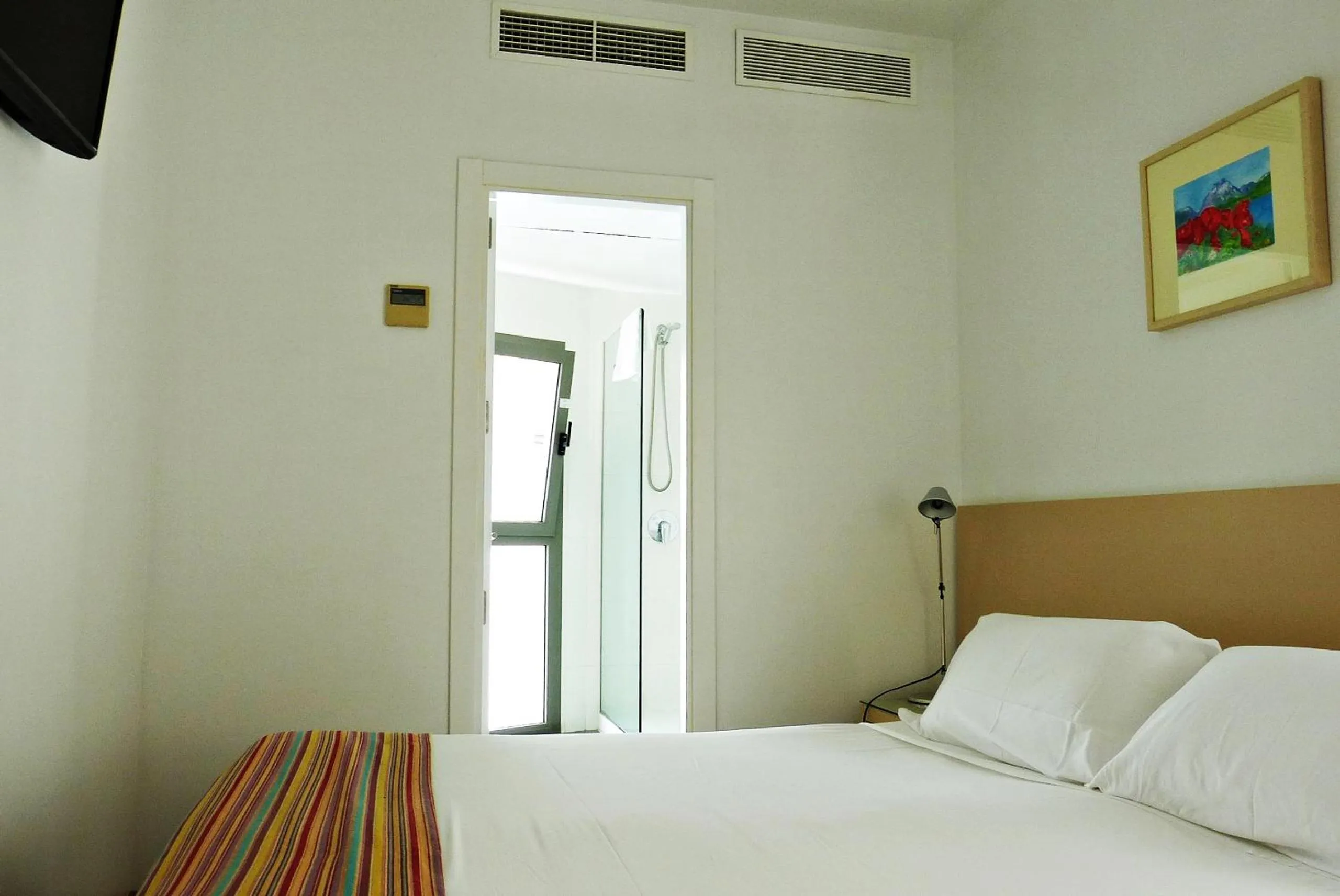 Bed in Hotel Apartamentos Patagonia Sur