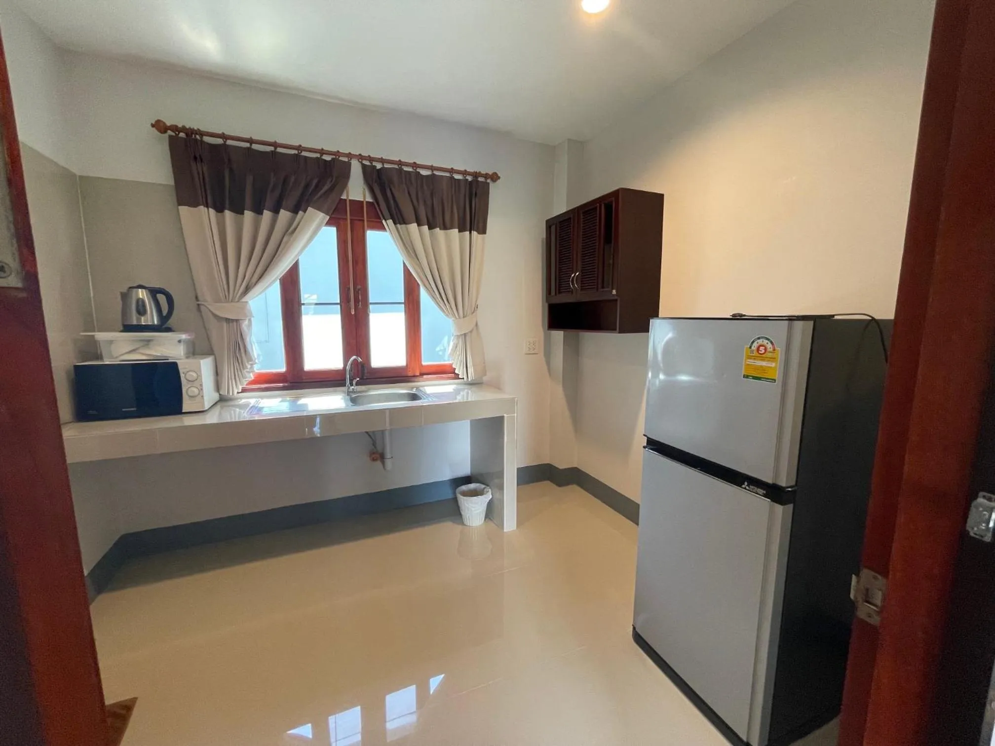 Kitchen or kitchenette in Breeze Bay Villa