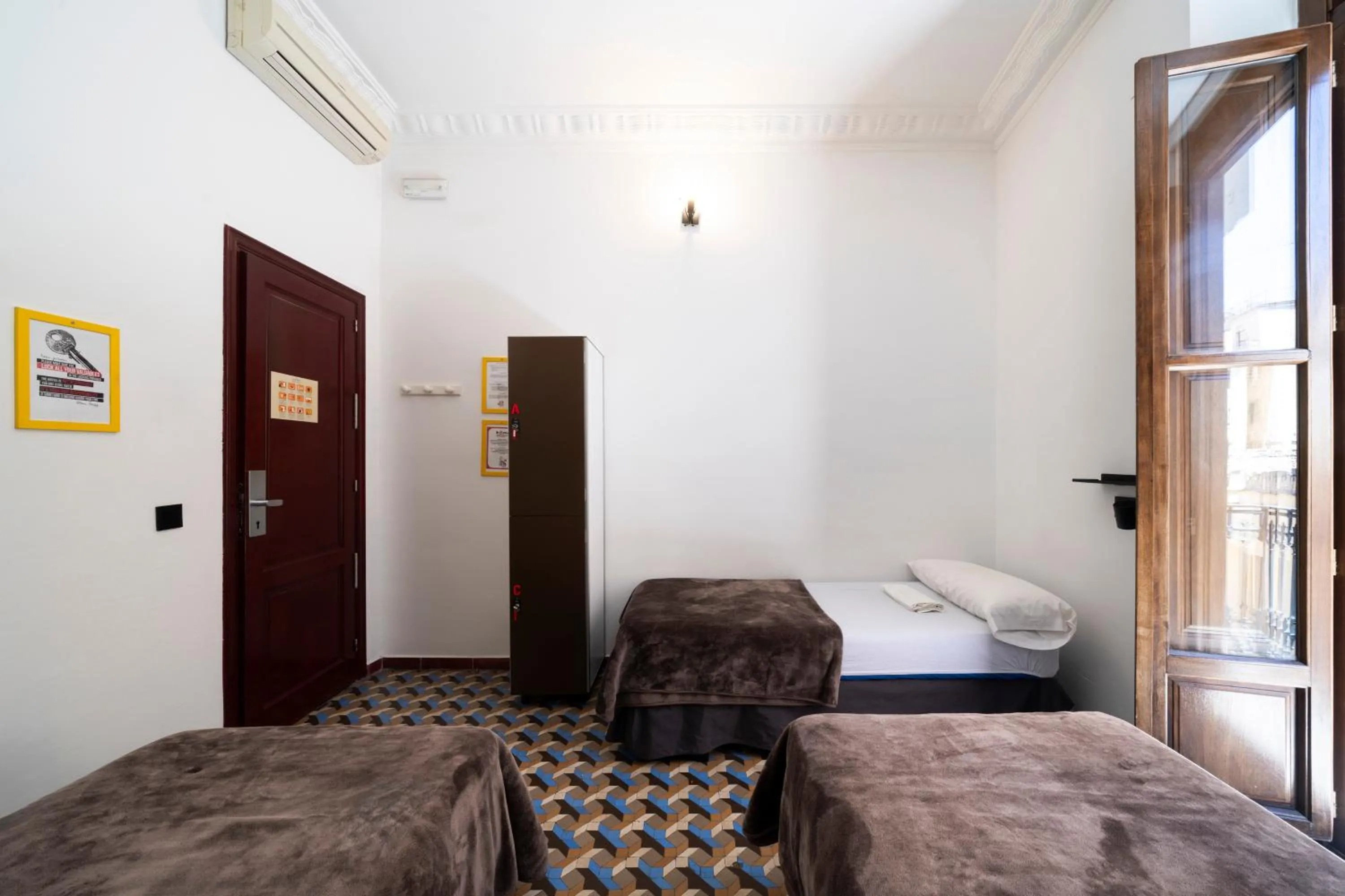 Bed in Home Youth Hostel by Feetup Hostels