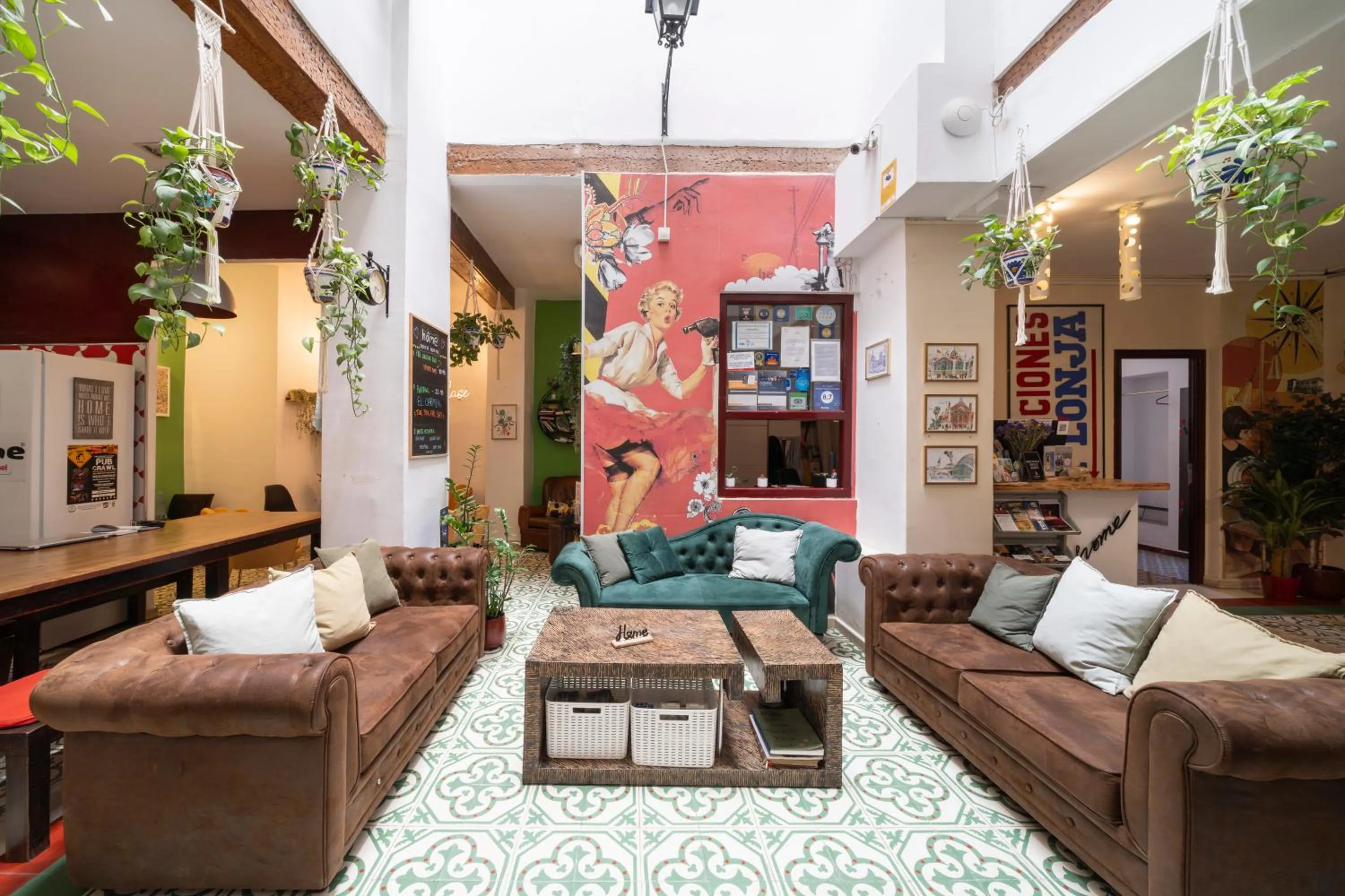 Communal lounge/ TV room in Home Youth Hostel by Feetup Hostels