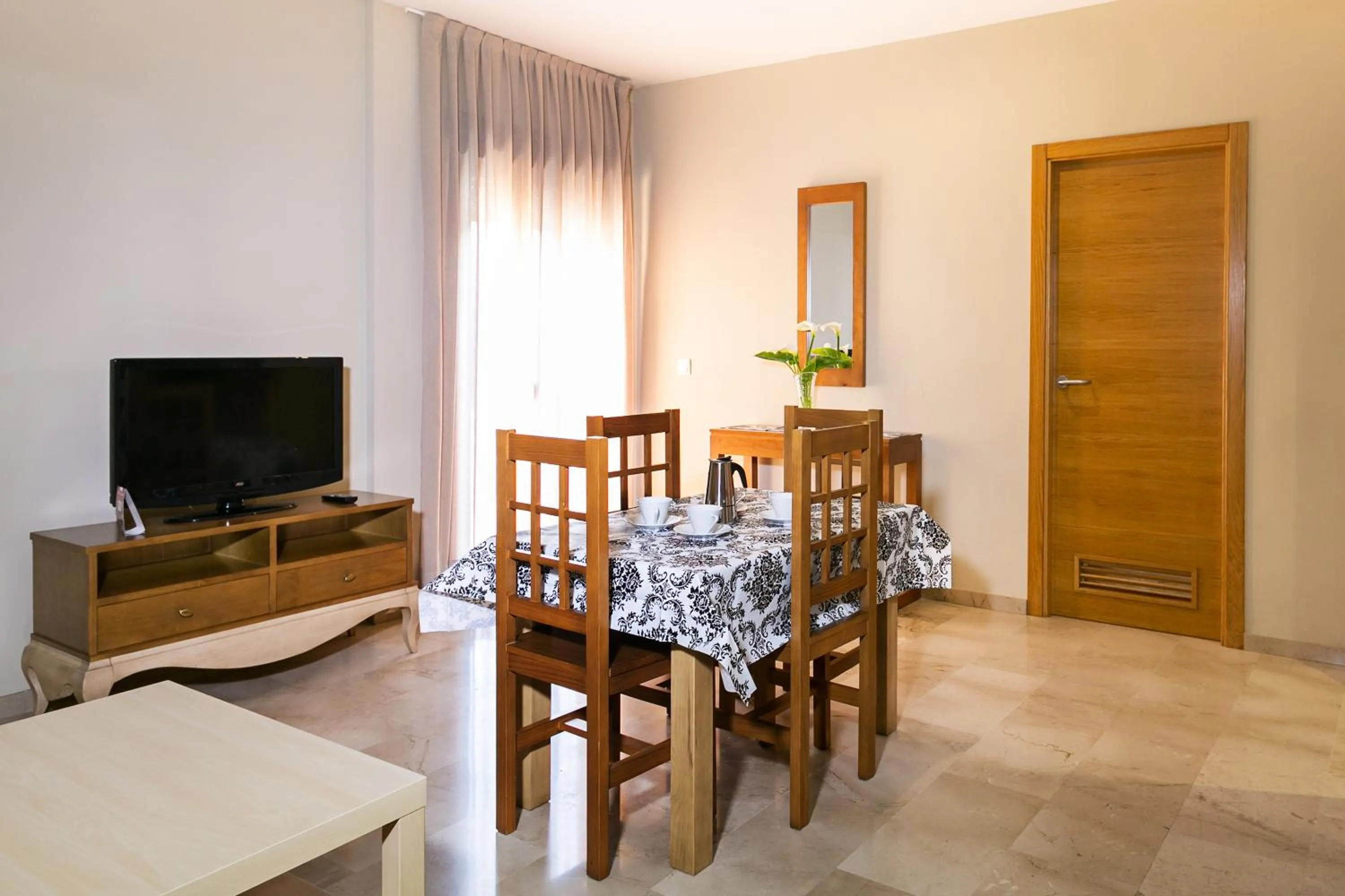 Communal lounge/ TV room in Apartamentos Turísticos La Castilleja