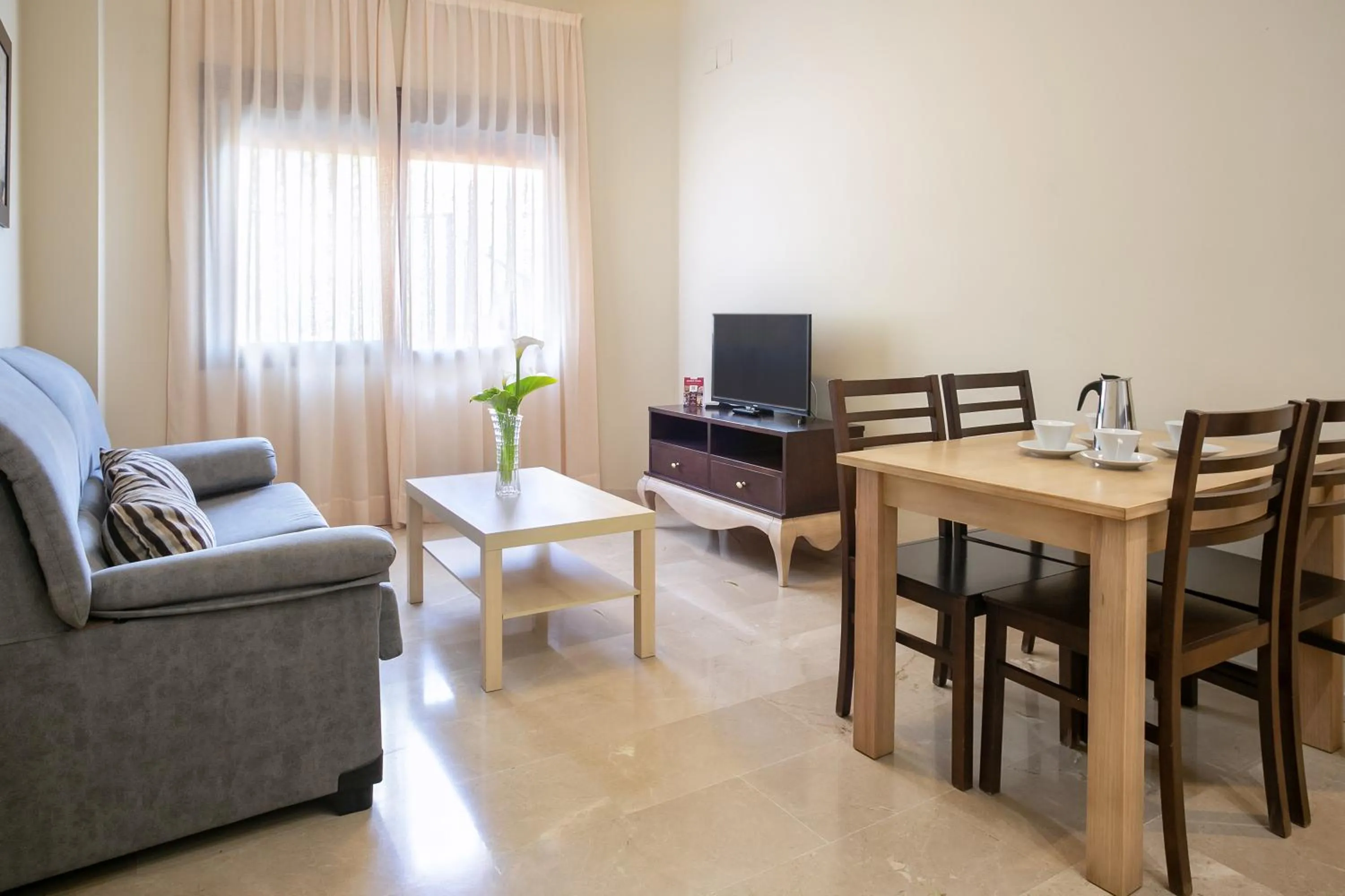 Communal lounge/ TV room in Apartamentos Turísticos La Castilleja