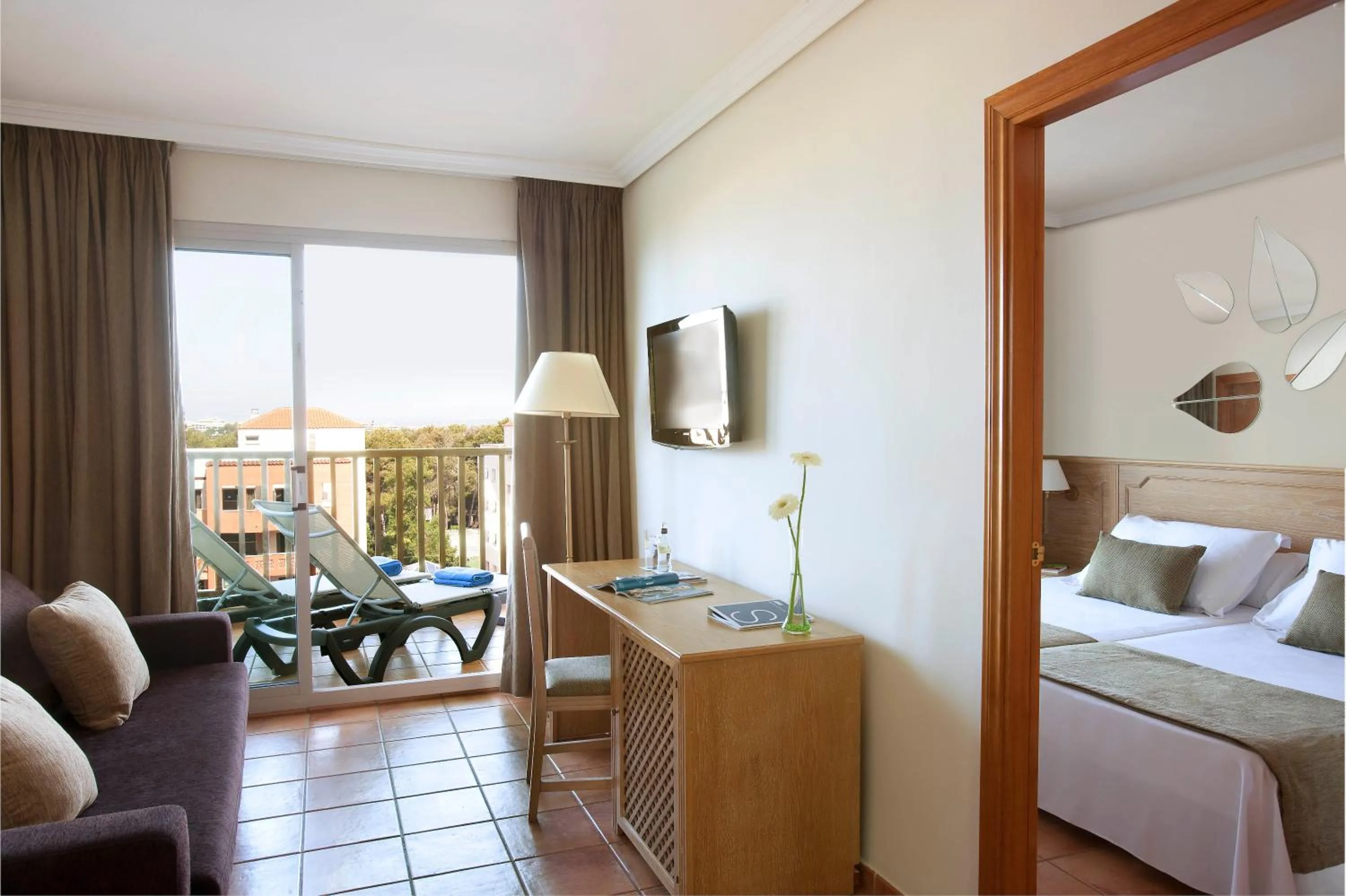 Seating area, Bed in H10 Mediterranean Village