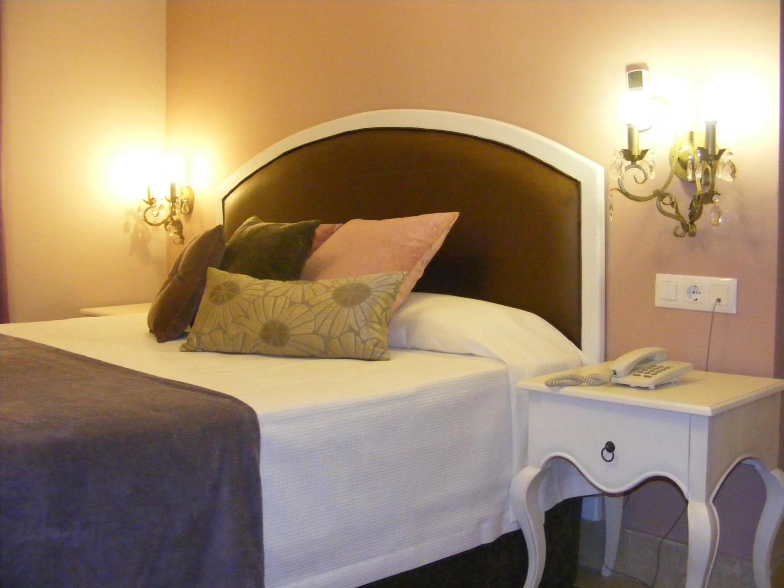 Bed in Hotel Sindhura