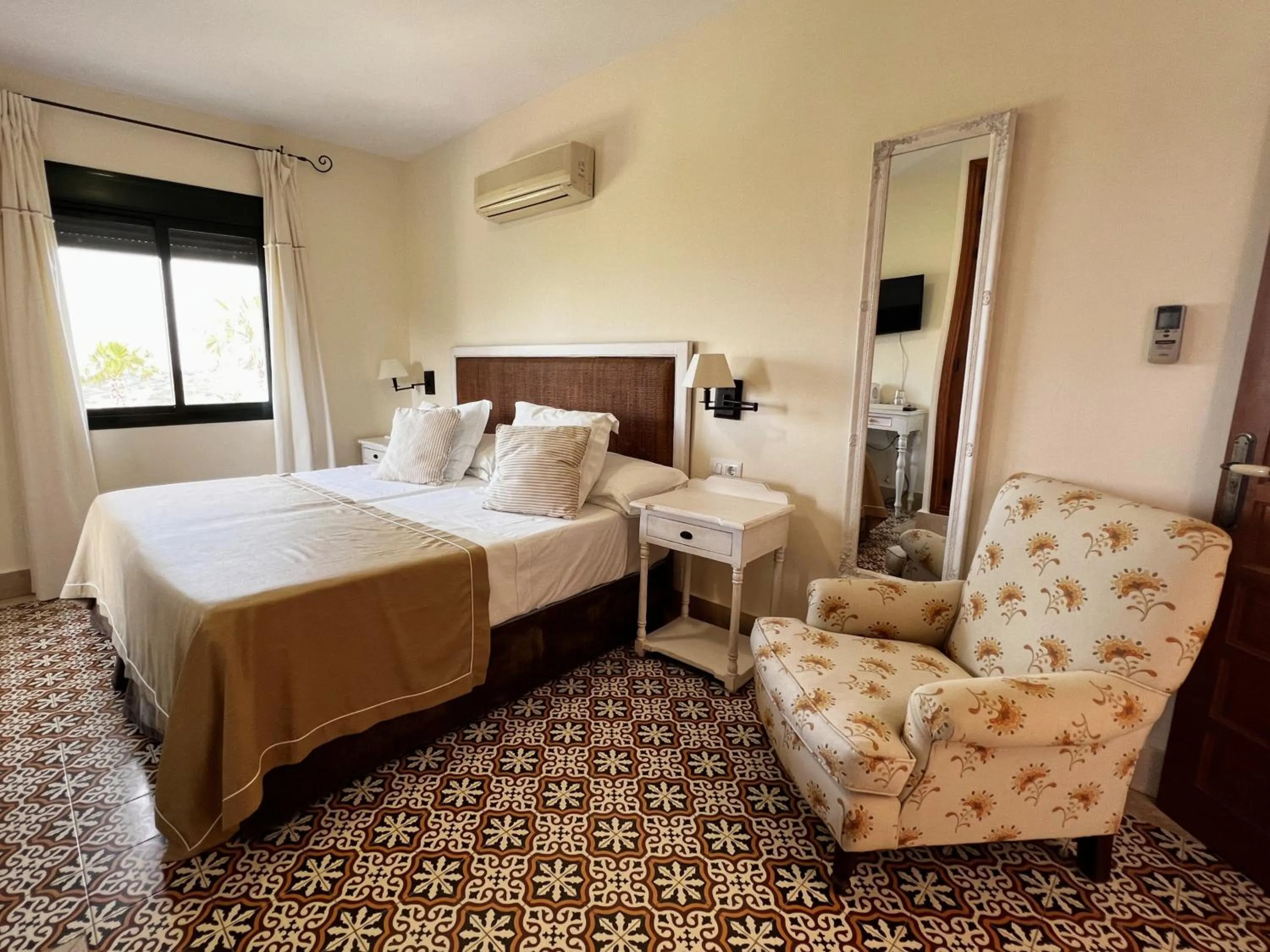 Bed in Hotel Sindhura