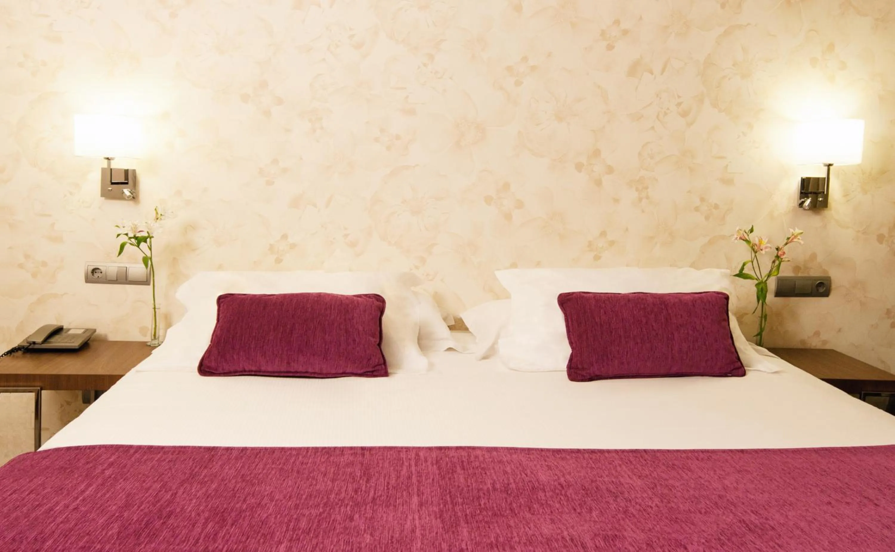 Bed in Apartosuites Jardines de Sabatini