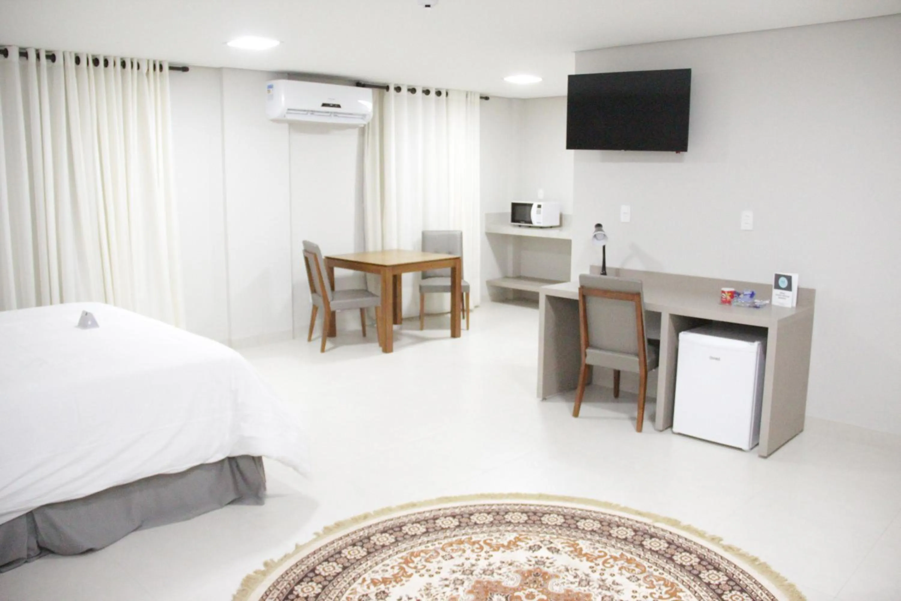 Kitchen or kitchenette, Bed in Gran Park Hotel e Convenções