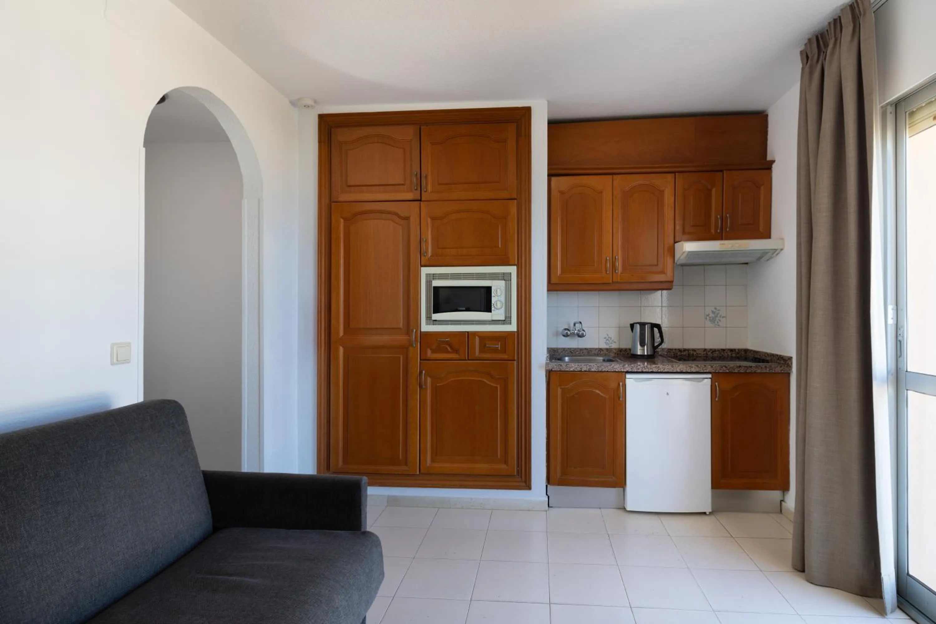 Kitchen or kitchenette in Ramada Hotel & Suites by Wyndham Costa del Sol