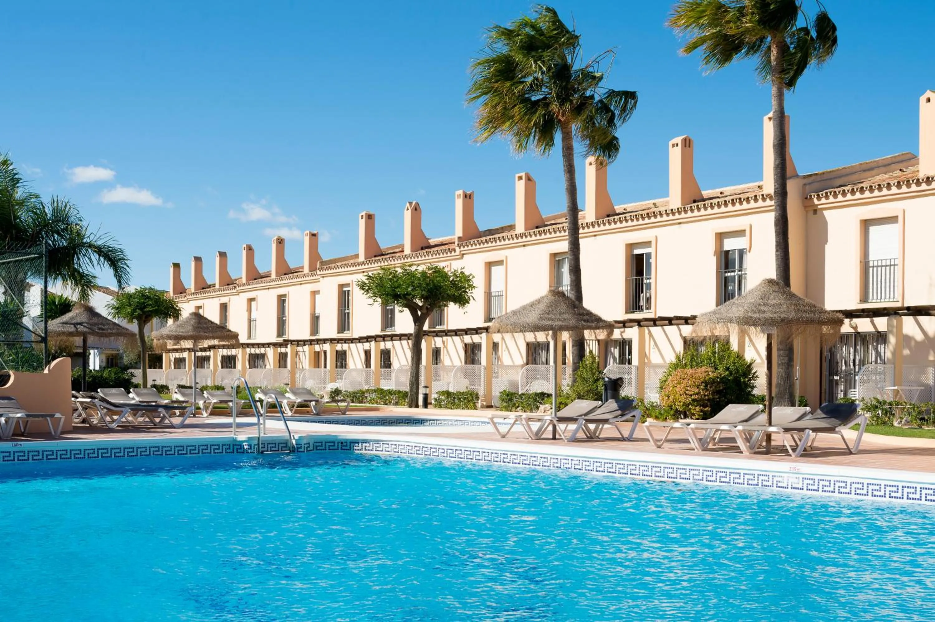 Swimming pool in Ramada Hotel & Suites by Wyndham Costa del Sol