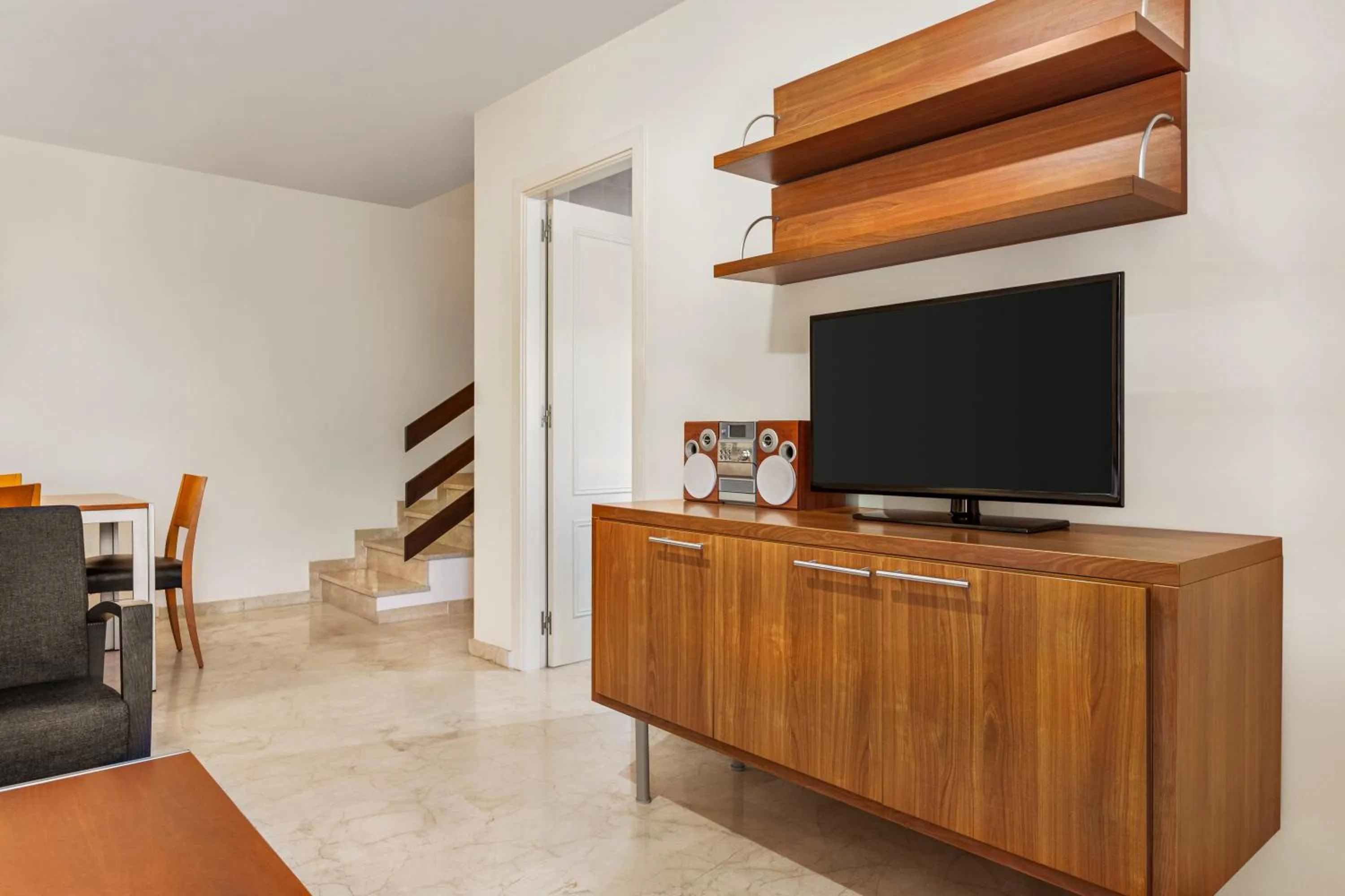 TV and multimedia in Ramada Hotel & Suites by Wyndham Costa del Sol