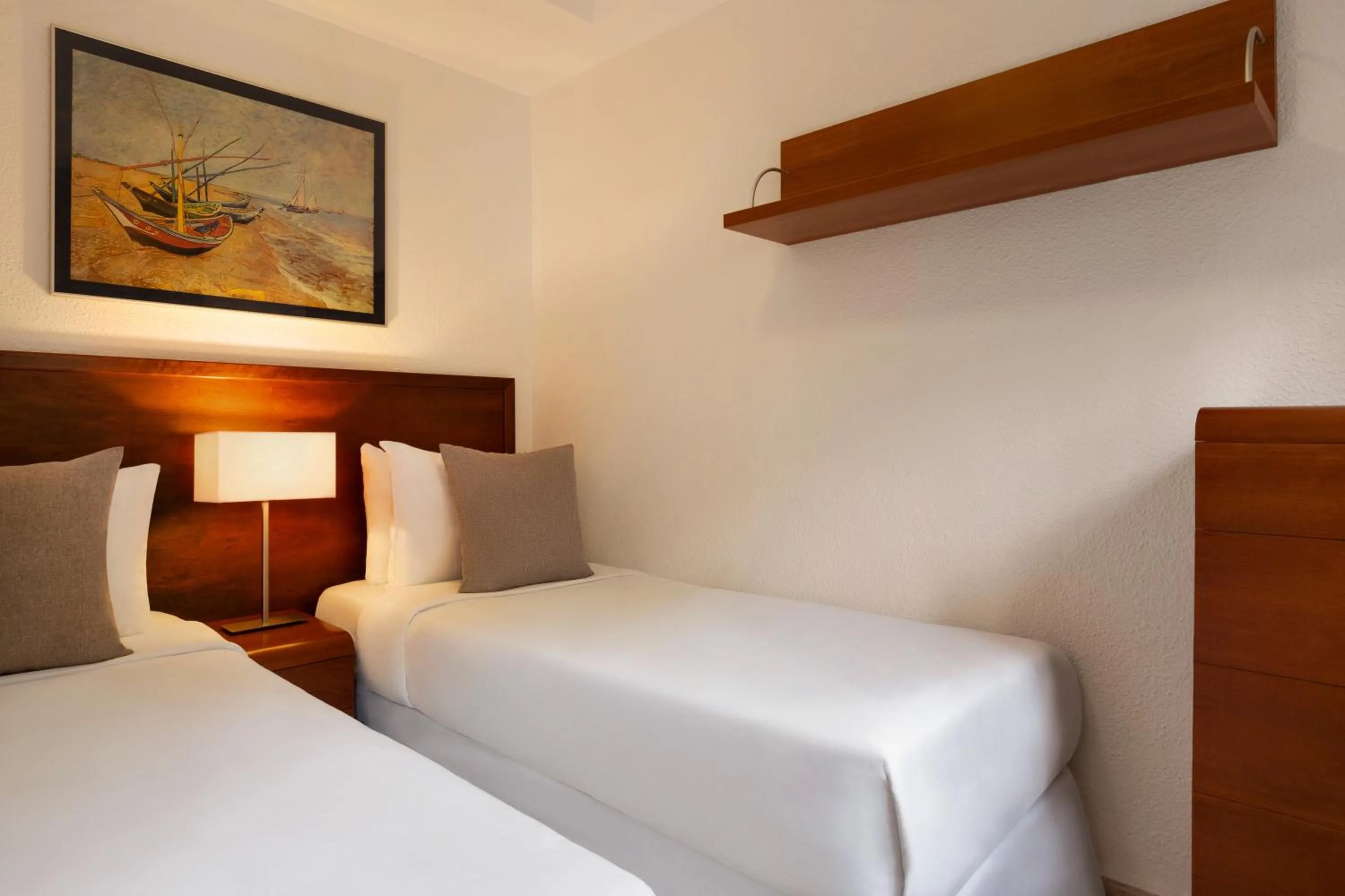 Bed in Ramada Hotel & Suites by Wyndham Costa del Sol