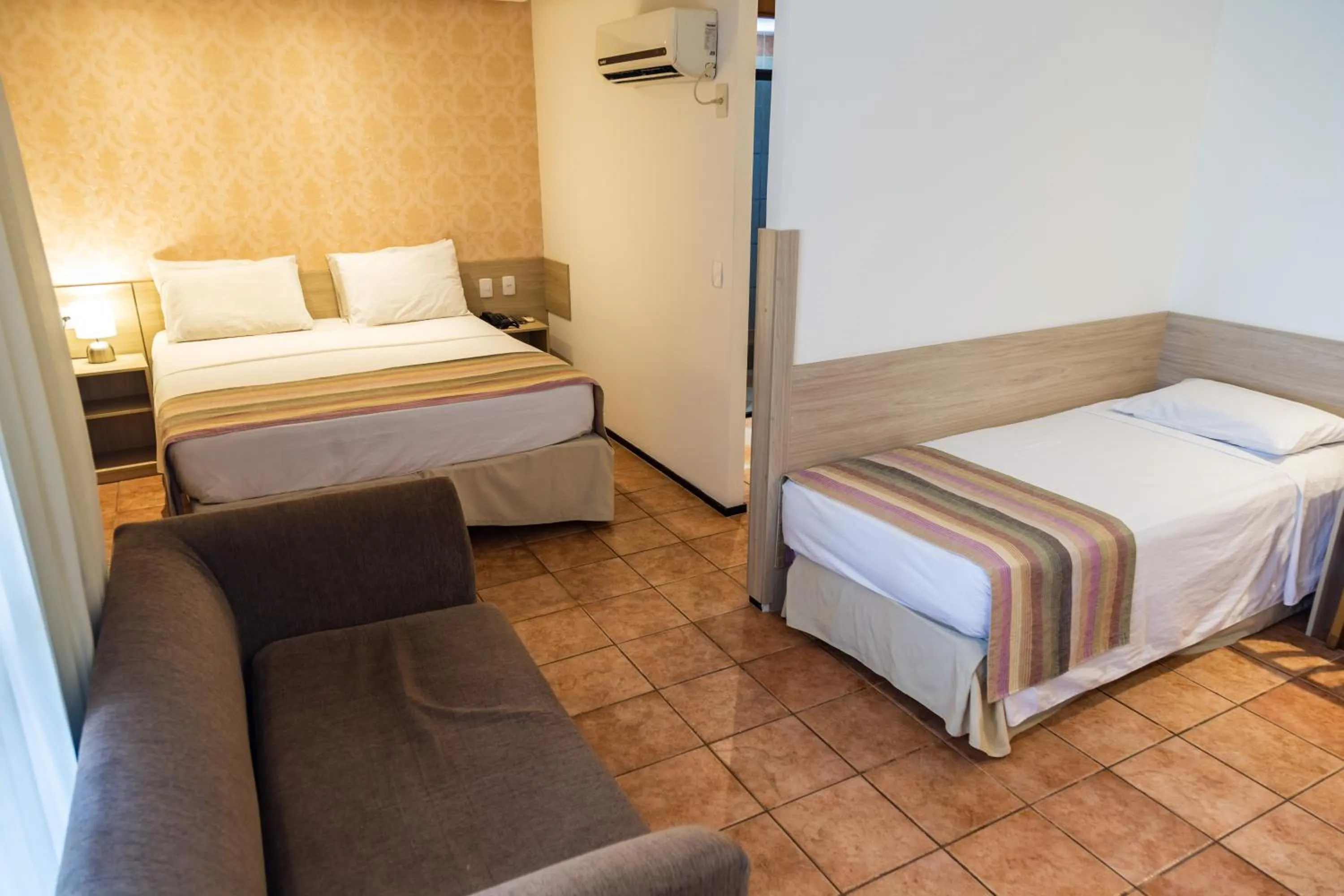 Bed in Plaza Praia Suítes