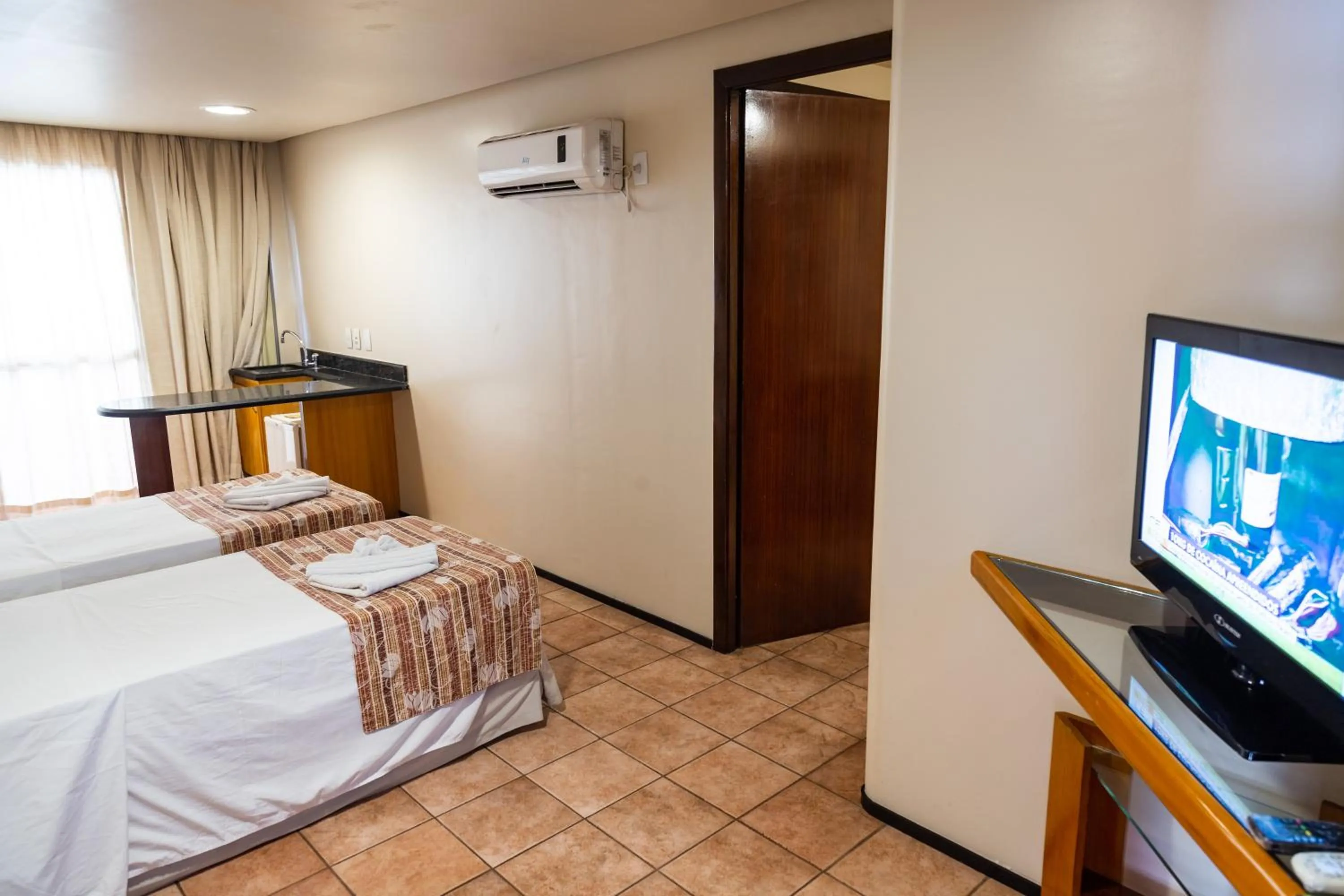 Bed in Plaza Praia Suítes