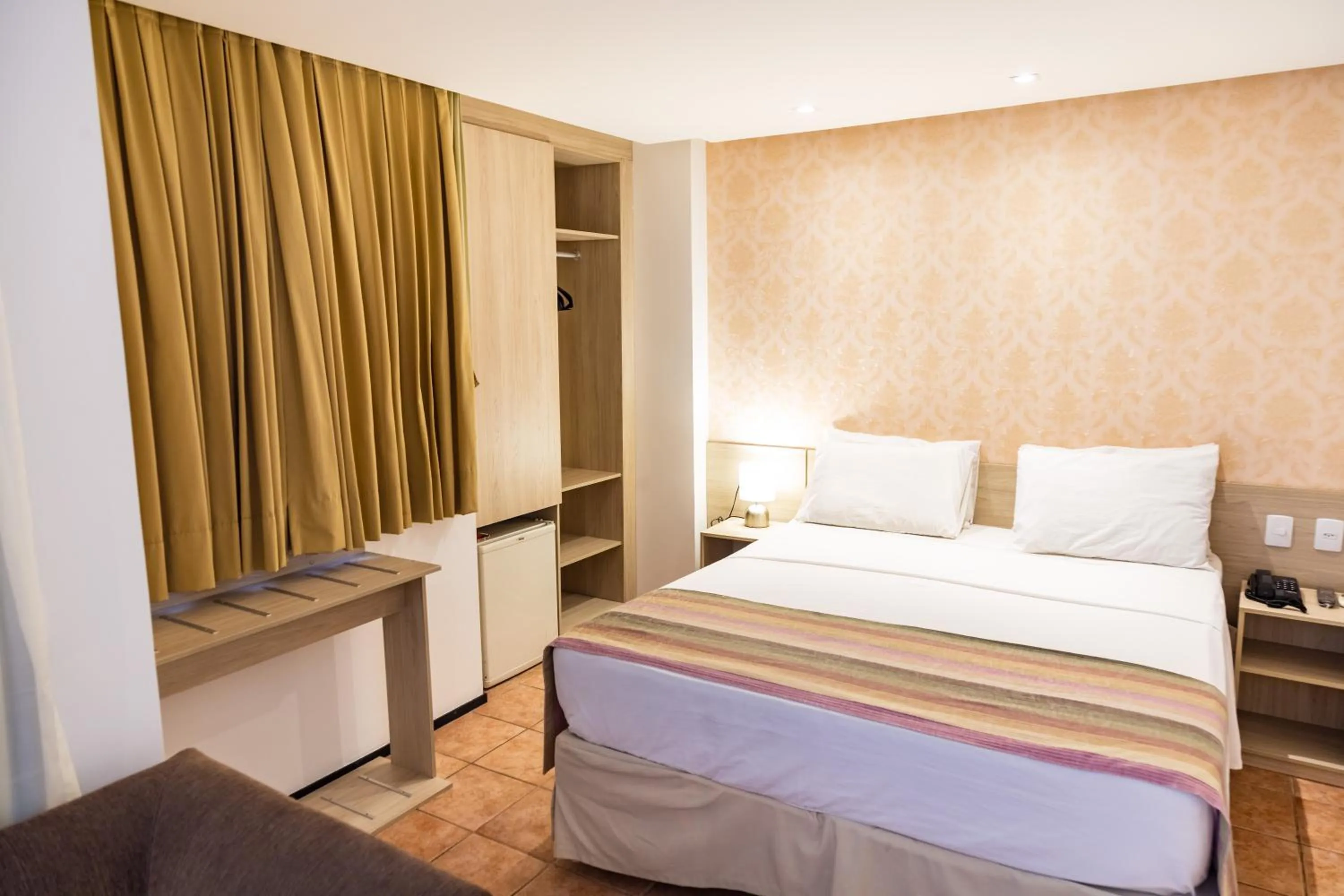 Bed in Plaza Praia Suítes