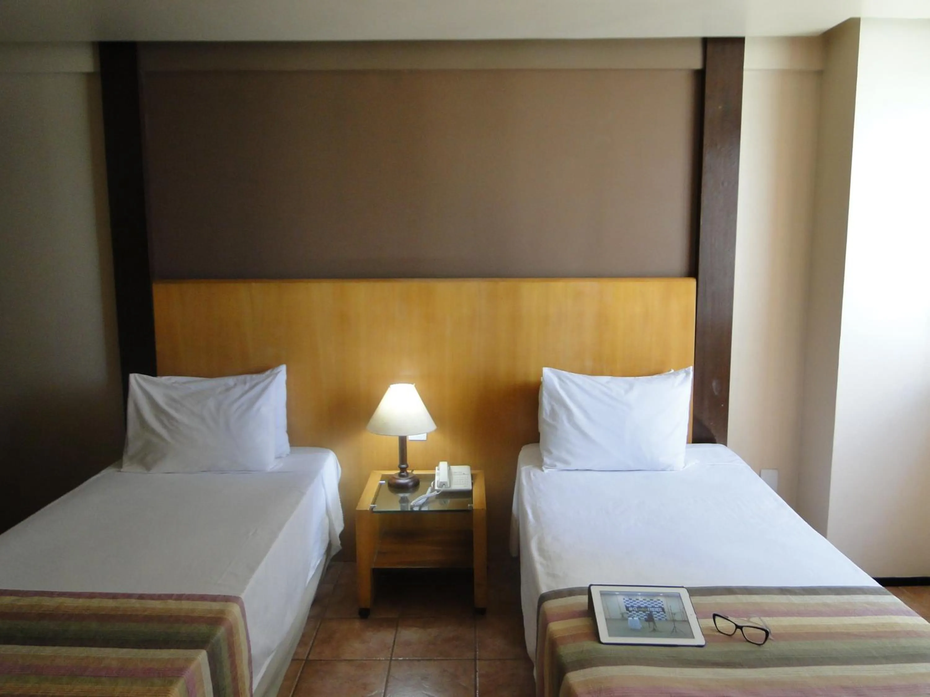 Bed in Plaza Praia Suítes