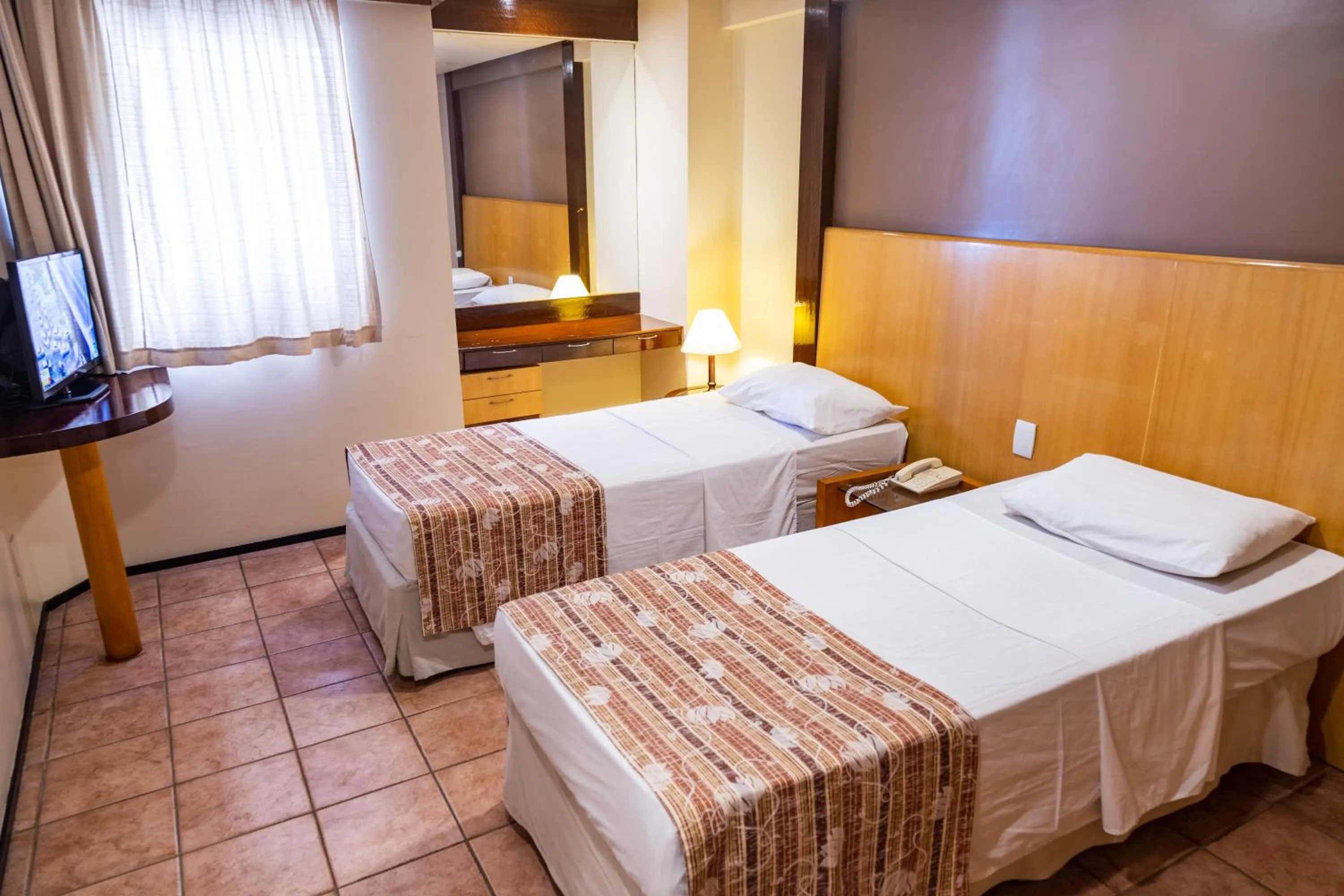 Bed in Plaza Praia Suítes